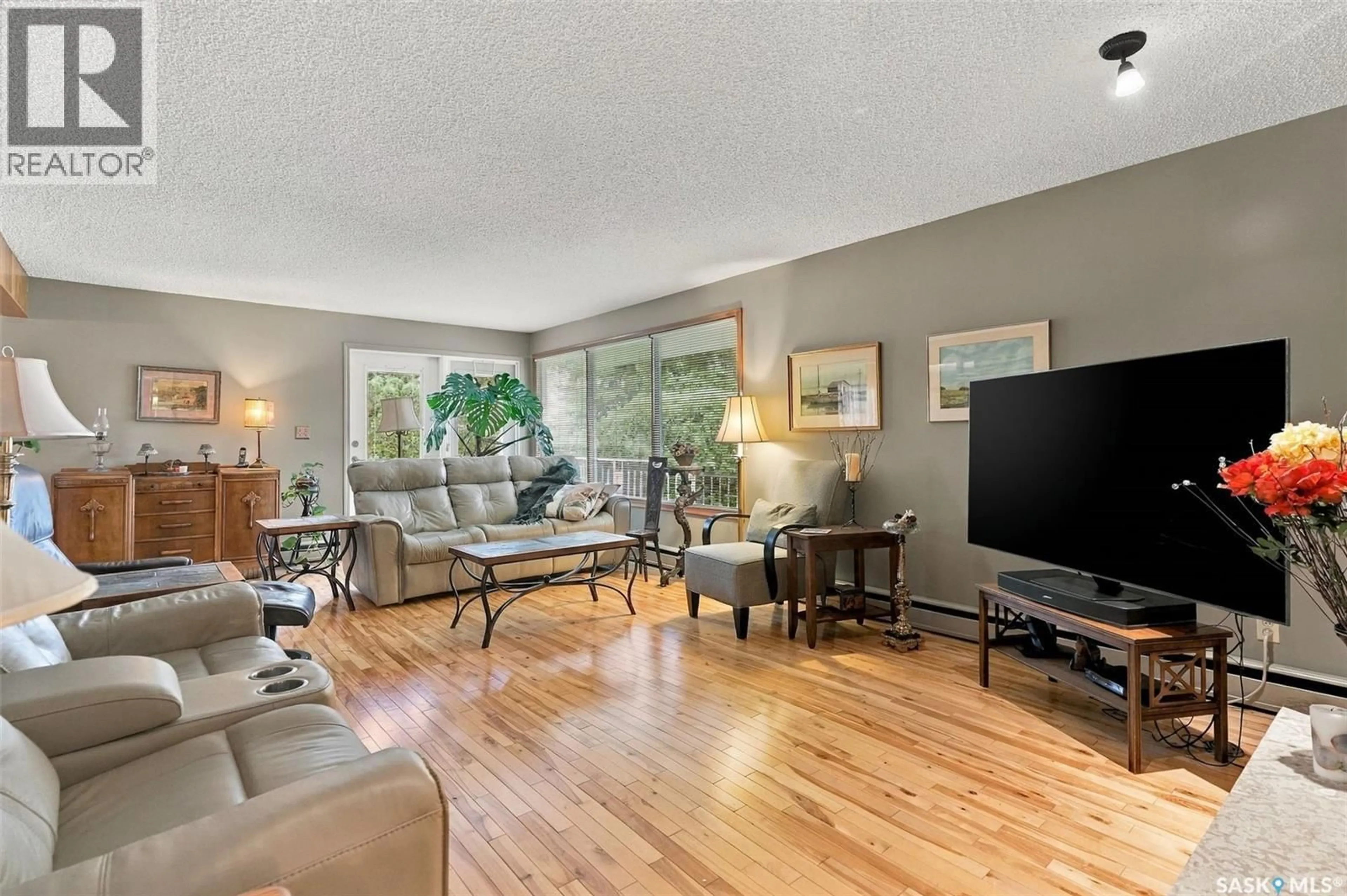 Living room with furniture, unknown for 4002 ELPHINSTONE STREET, Regina Saskatchewan S4S3K9