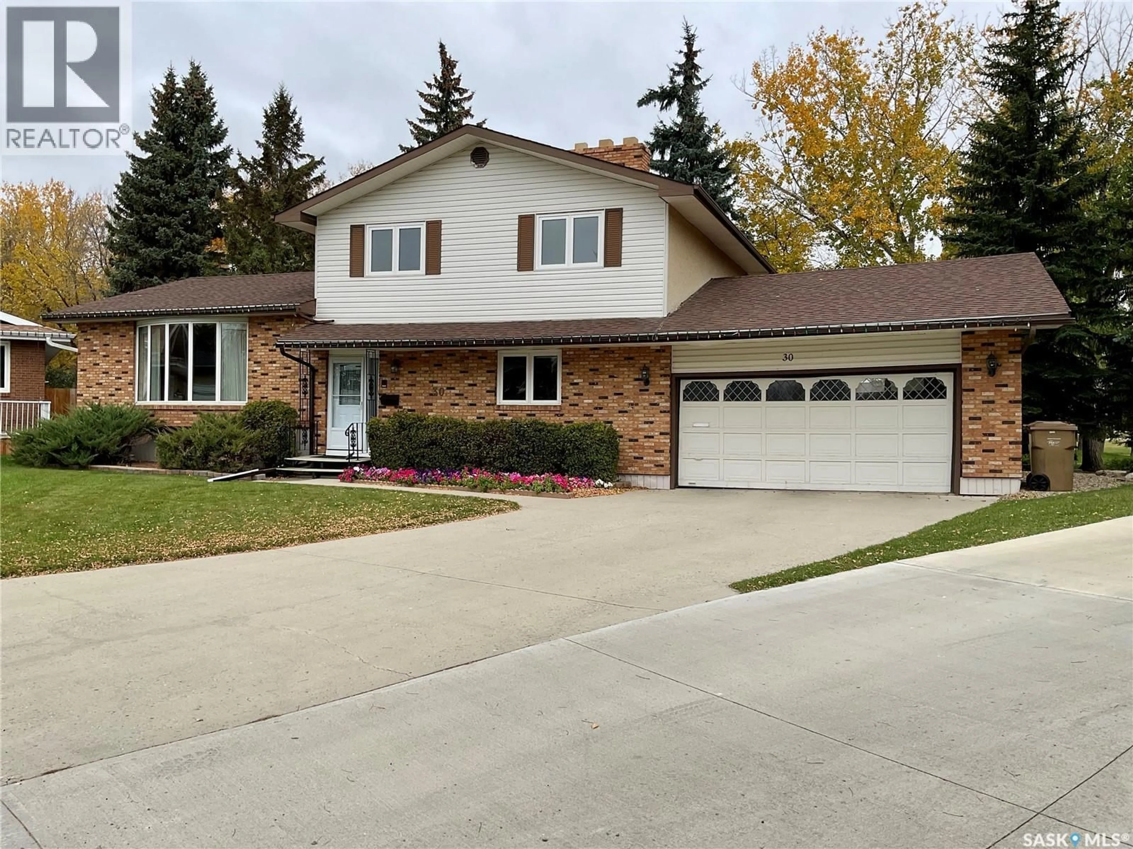 Home with brick exterior material, street for 30 NICOL PLACE, Regina Saskatchewan S4V0B9