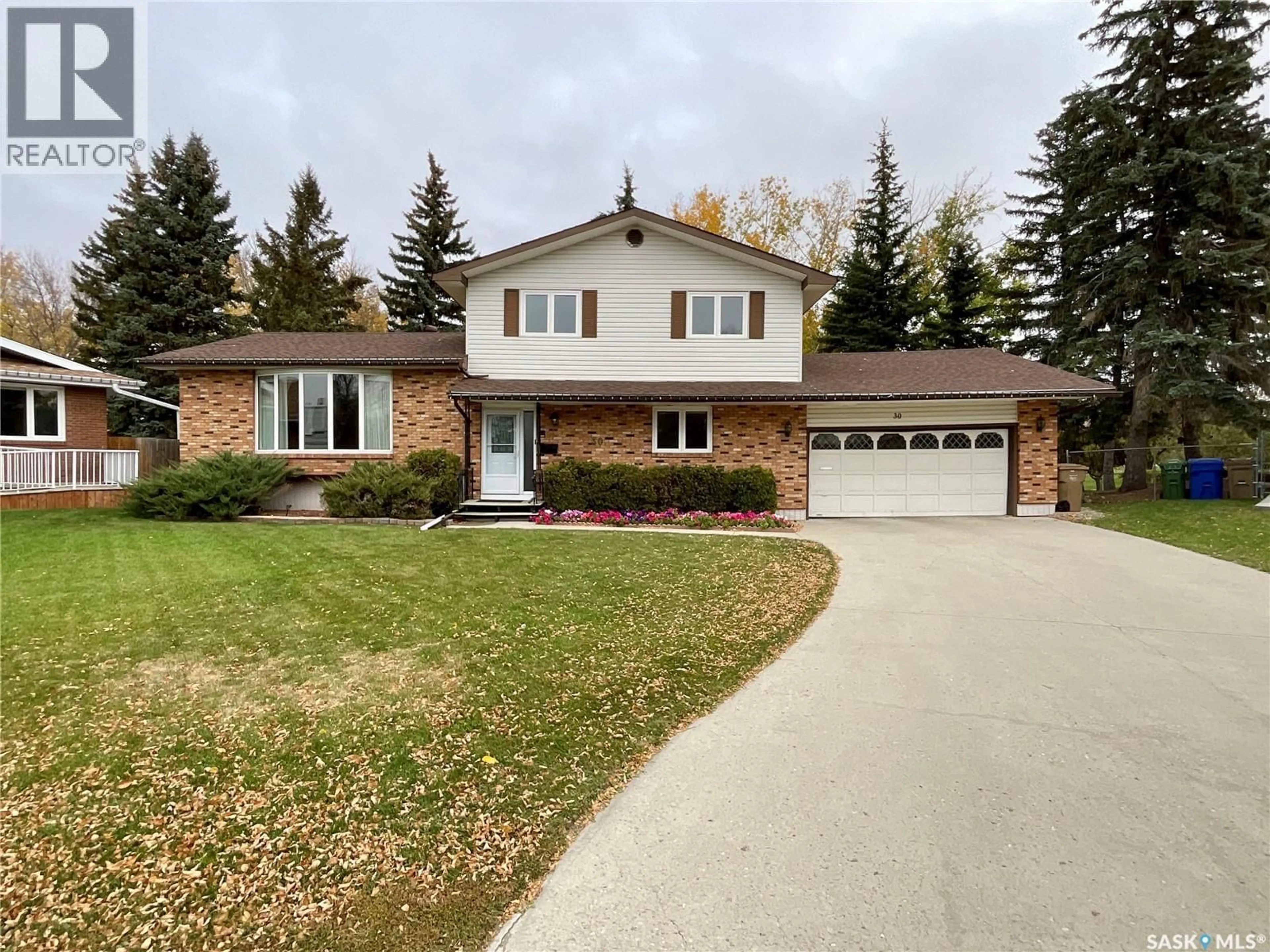 Home with brick exterior material, street for 30 NICOL PLACE, Regina Saskatchewan S4V0B9