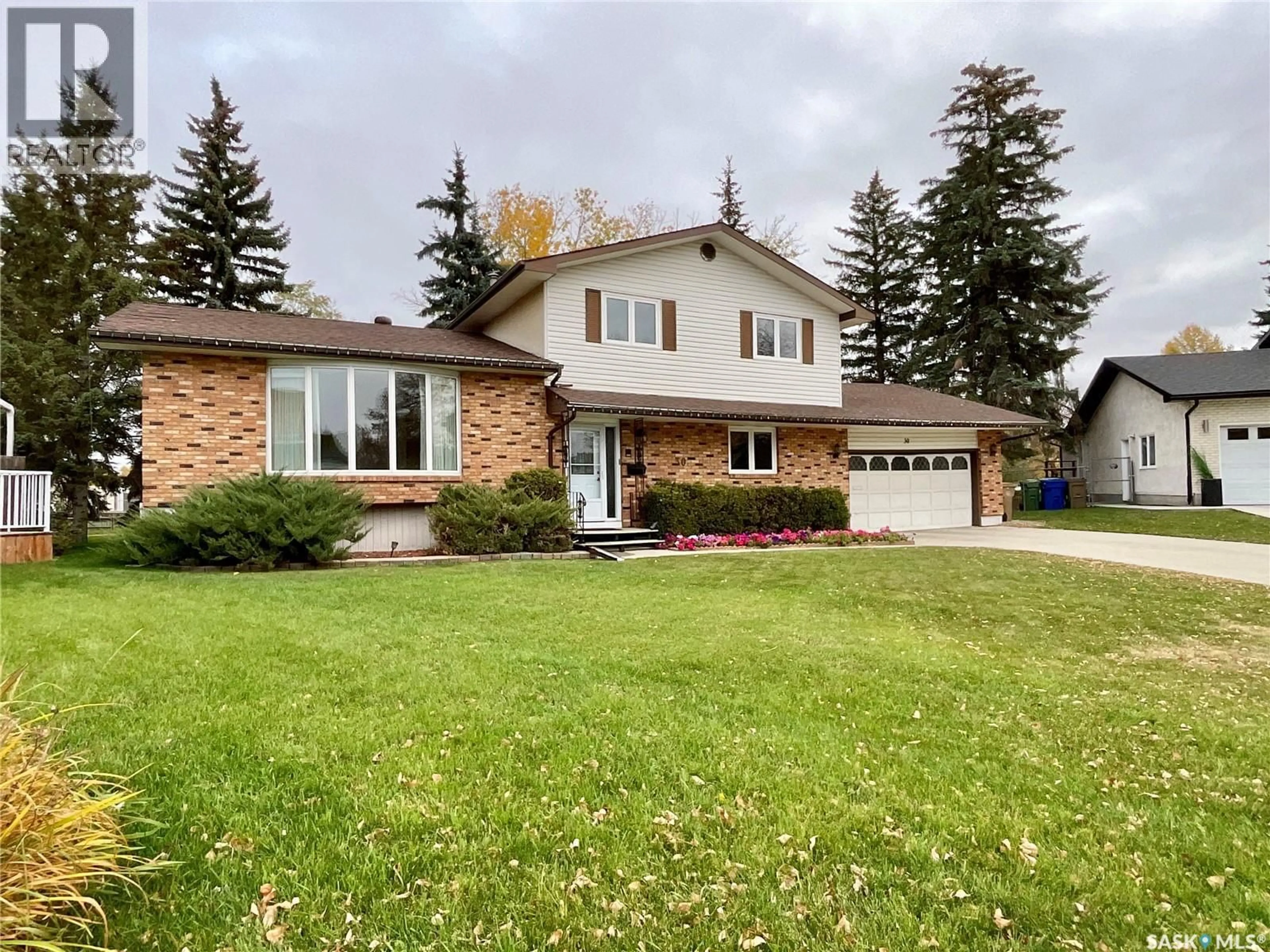 Home with brick exterior material, street for 30 NICOL PLACE, Regina Saskatchewan S4V0B9