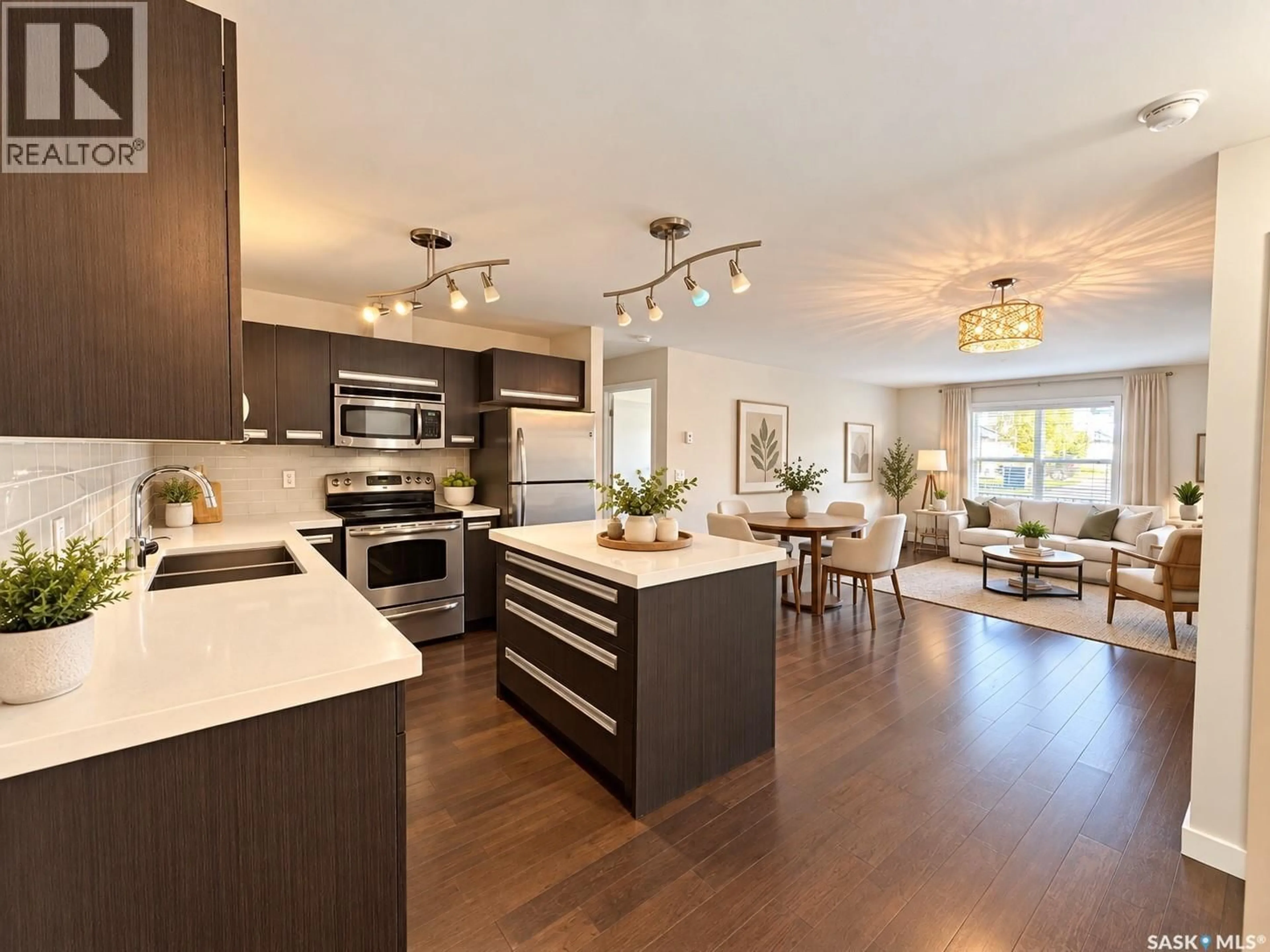 Open concept kitchen, wood/laminate floor for 211 - 105 LEDINGHAM STREET, Saskatoon Saskatchewan S7V0C5