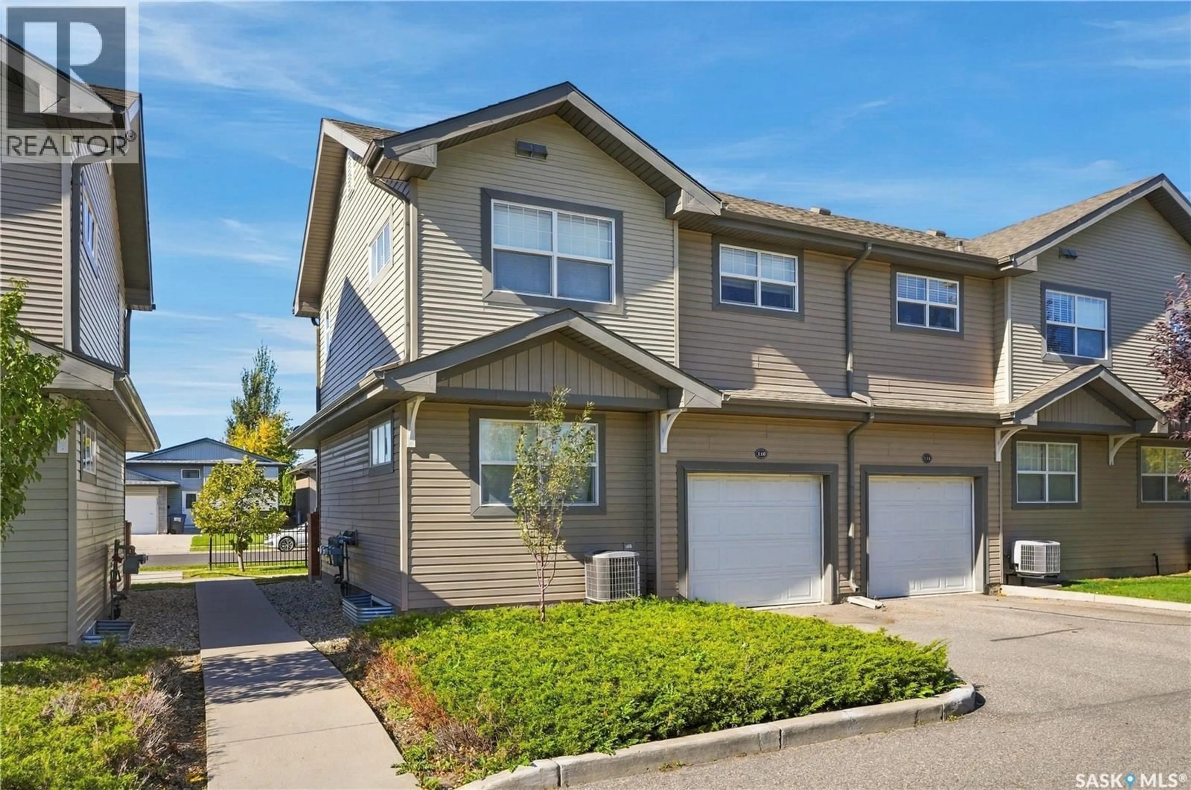 Home with vinyl exterior material, street for 410 - 110 STENSRUD ROAD, Saskatoon Saskatchewan S7W0B7