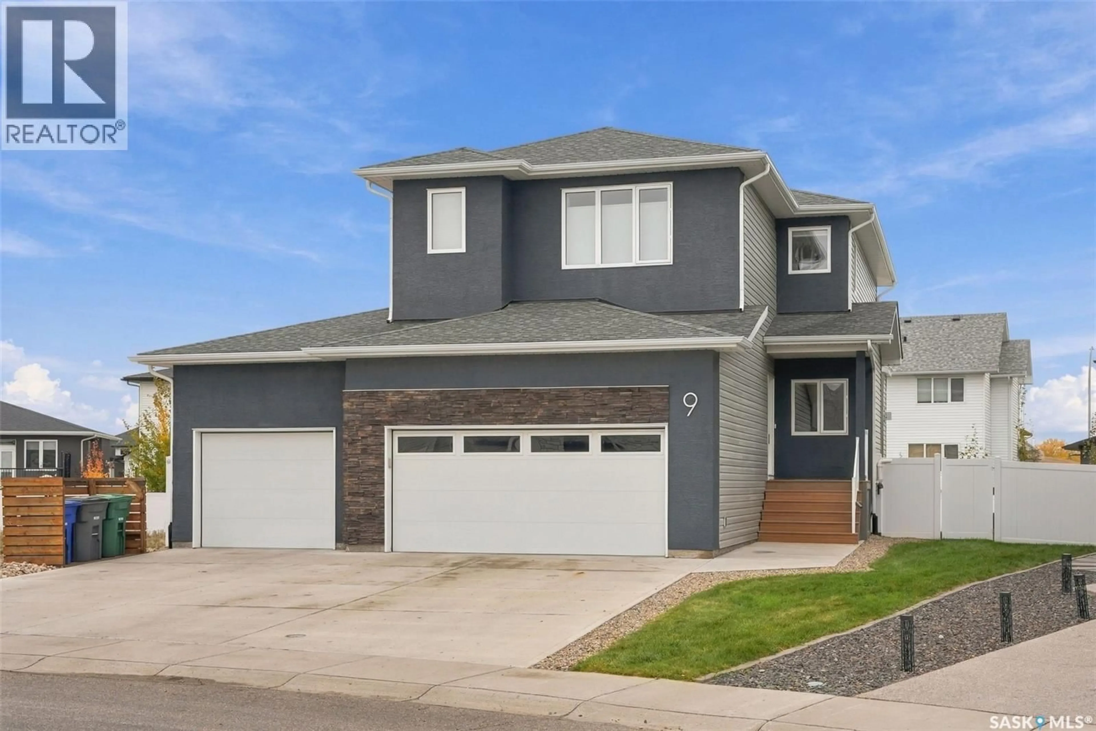 Home with vinyl exterior material, street for 9 HUDSON DRIVE, Pilot Butte Saskatchewan S0G3Z0
