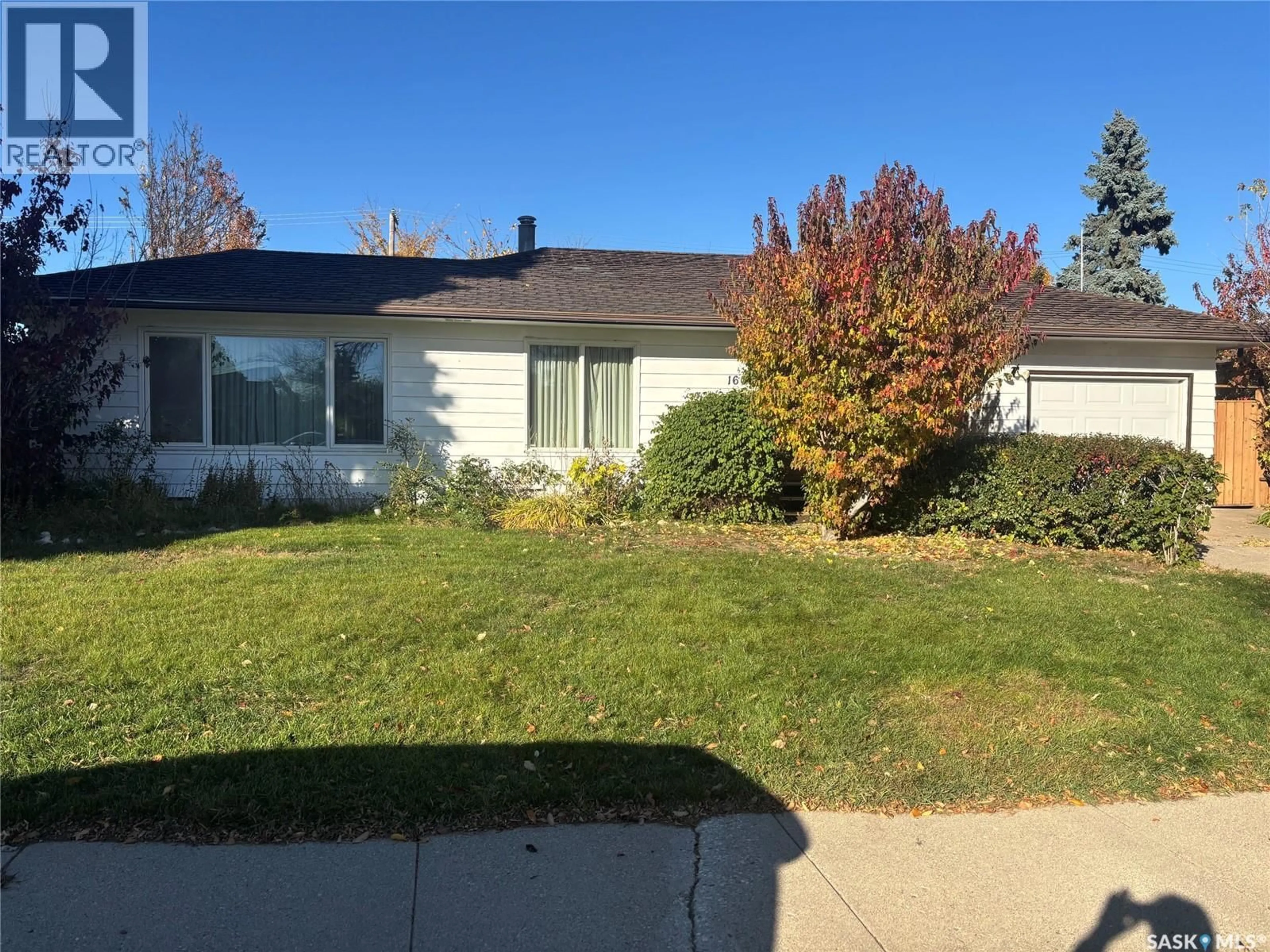 Home with vinyl exterior material, street for 1605 LANDA STREET, Saskatoon Saskatchewan S7J0P5