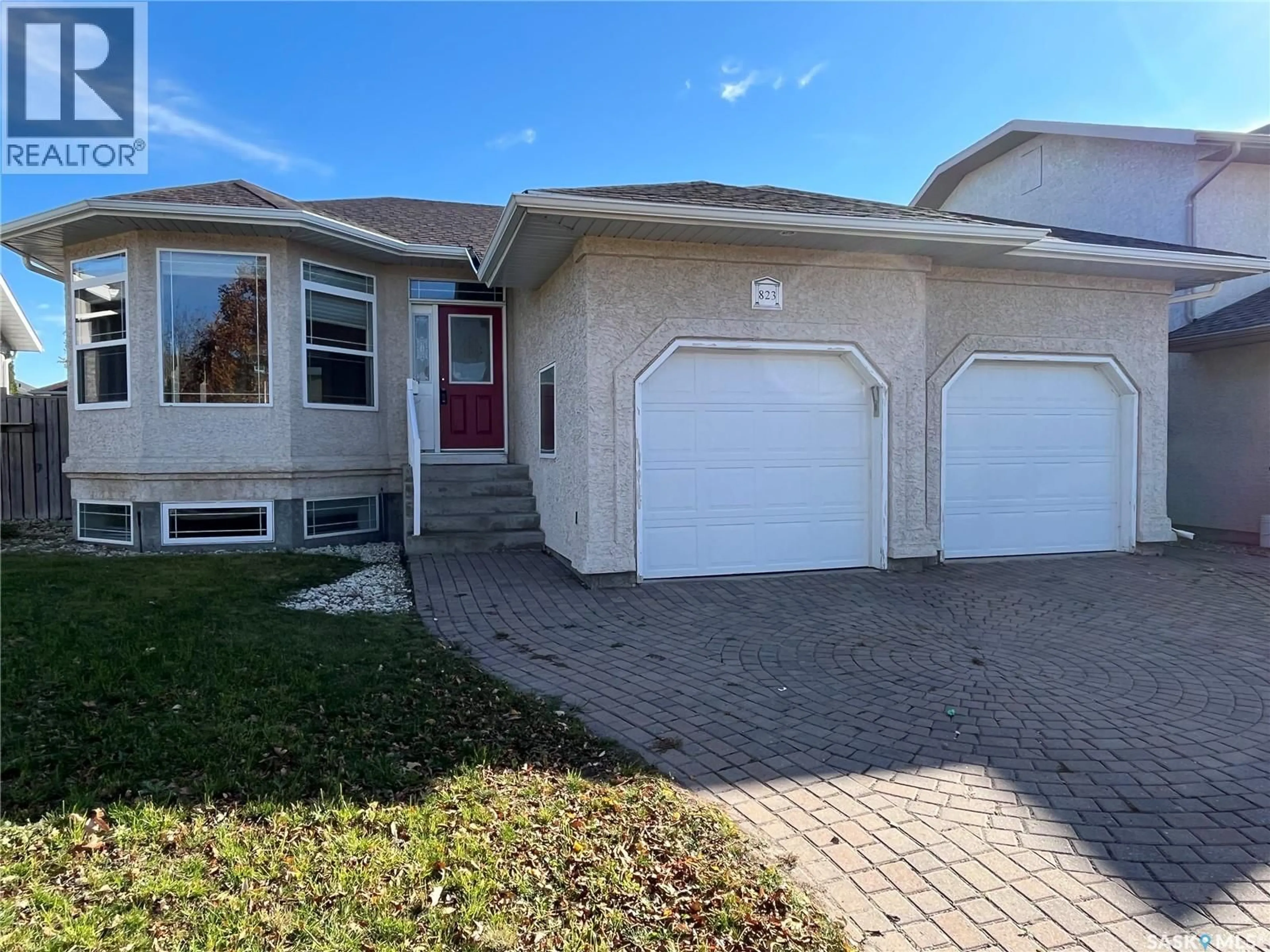 Home with vinyl exterior material, street for 823 BEECHMONT LANE, Saskatoon Saskatchewan S7V1C8