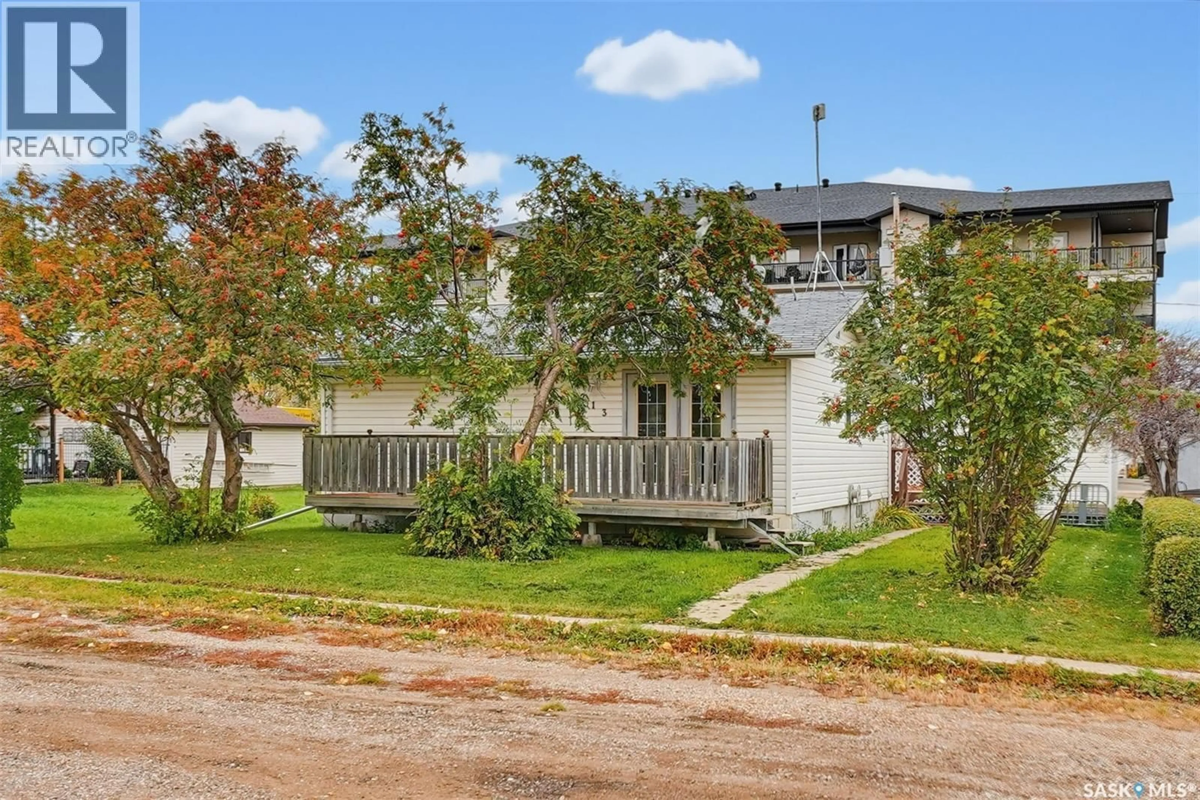 A pic from outside/outdoor area/front of a property/back of a property/a pic from drone, street for 213 STEVENS AVENUE, Birch Hills Saskatchewan S0J0G0