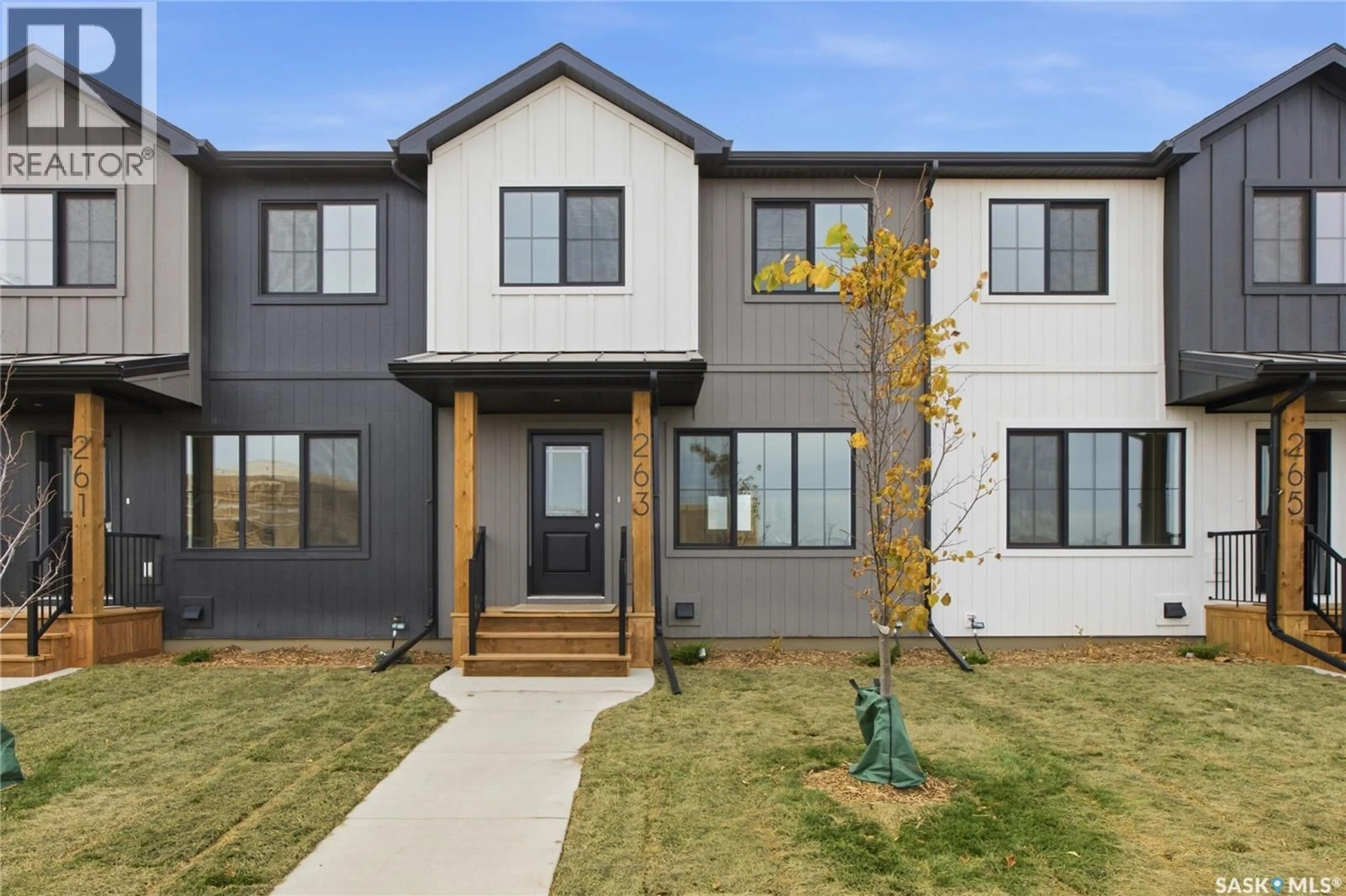 Home with brick exterior material, street for 263 MARK BEND, Saskatoon Saskatchewan S7V2B8