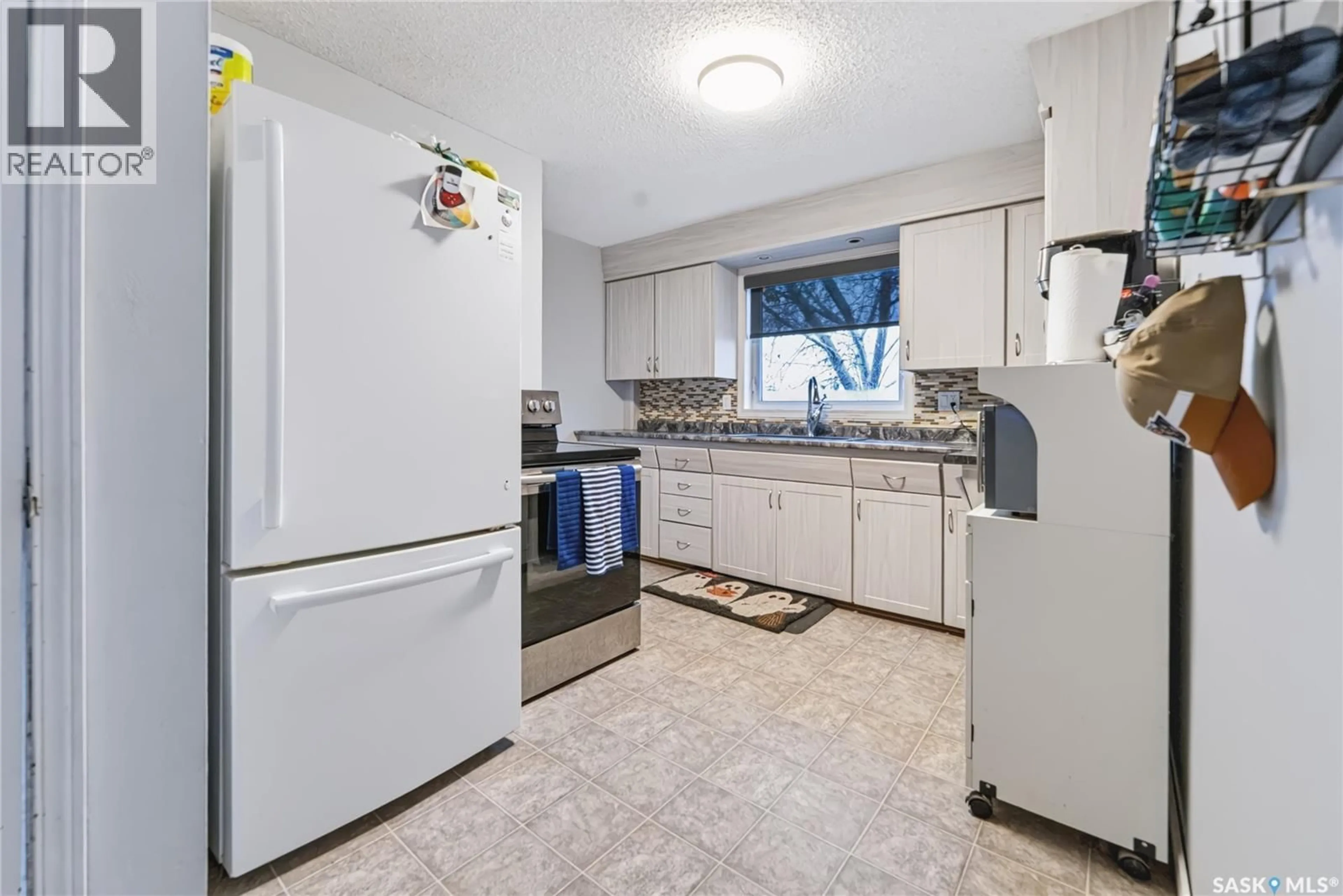 Standard kitchen, ceramic/tile floor for 205 WASHINGTON AVENUE, Hanley Saskatchewan S0G2E0