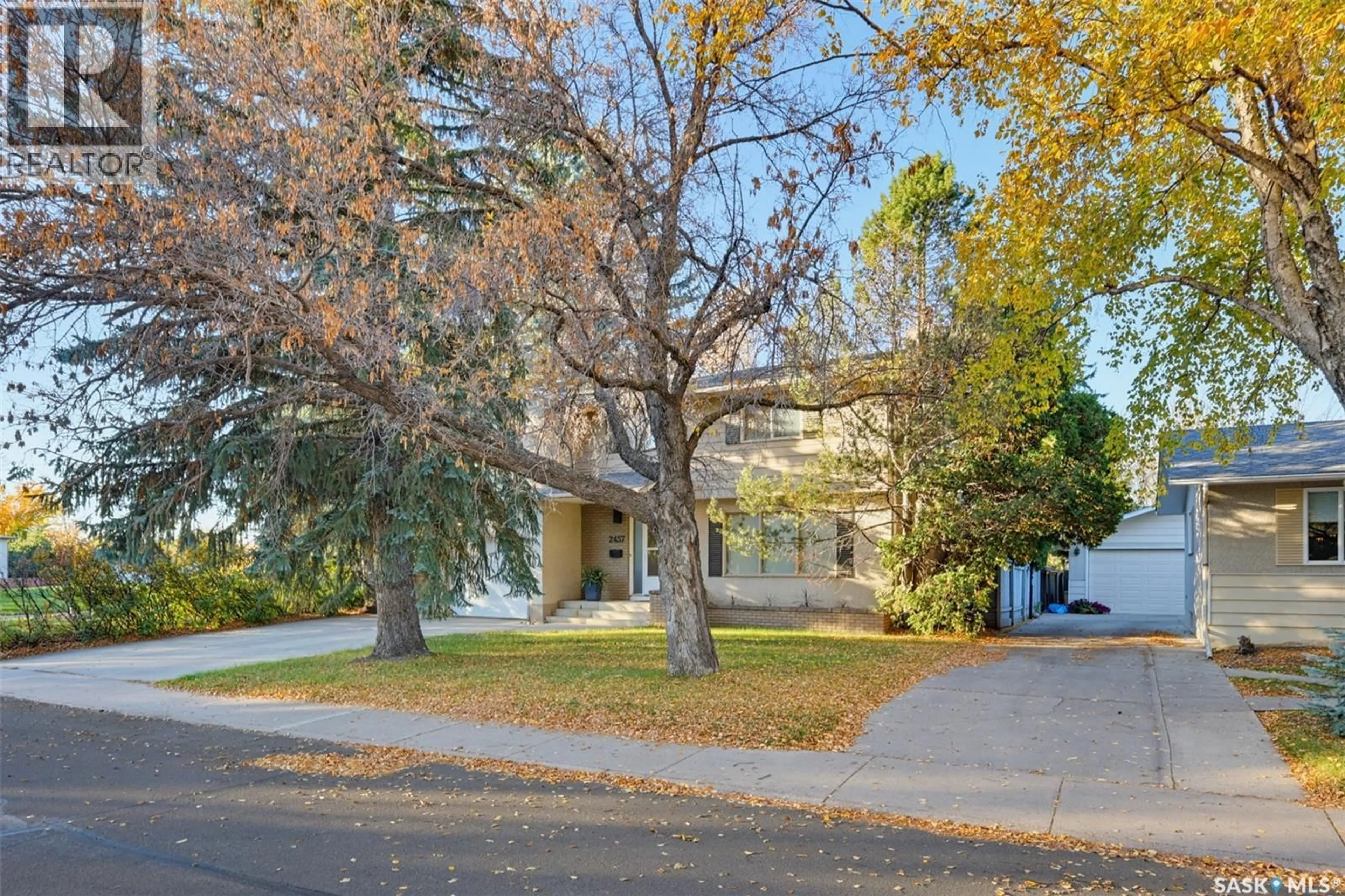 A pic from outside/outdoor area/front of a property/back of a property/a pic from drone, street for 2457 EASTVIEW, Saskatoon Saskatchewan S7J3E8