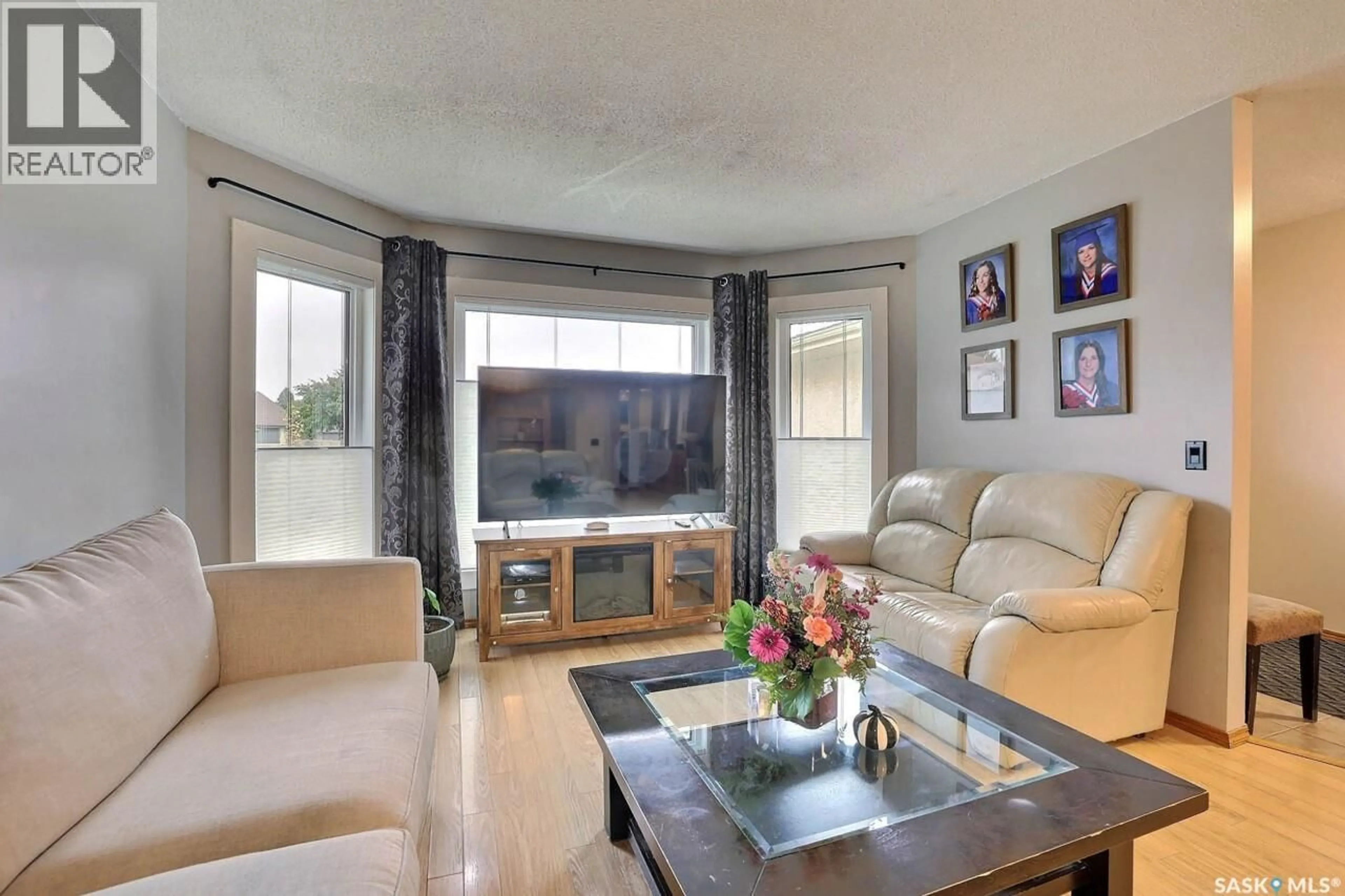 Living room with furniture, unknown for 242 PAR PLACE, Regina Saskatchewan S4Y1H3