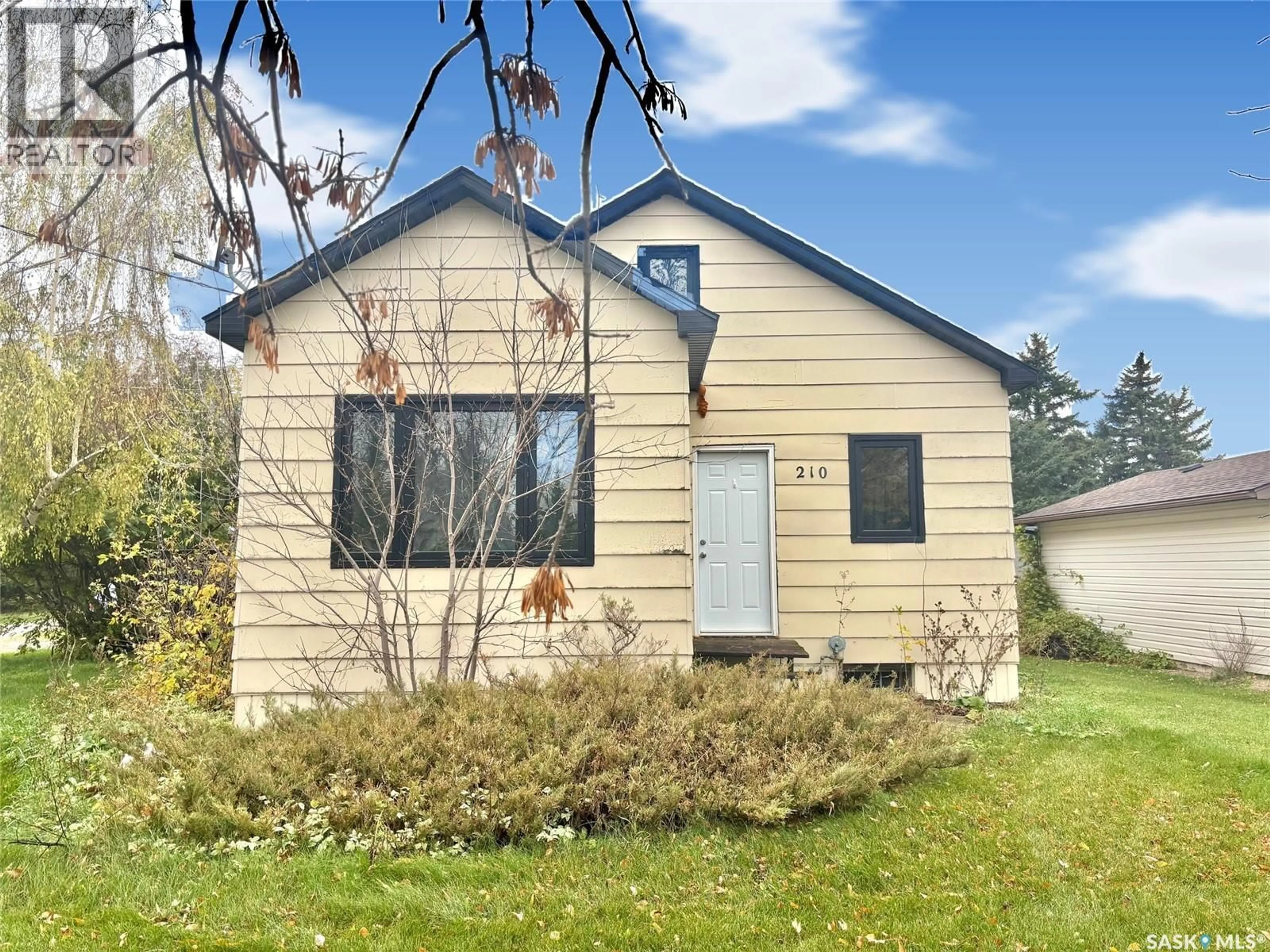 Home with vinyl exterior material, street for 210 TAYLOR STREET, Neudorf Saskatchewan S0A2T0