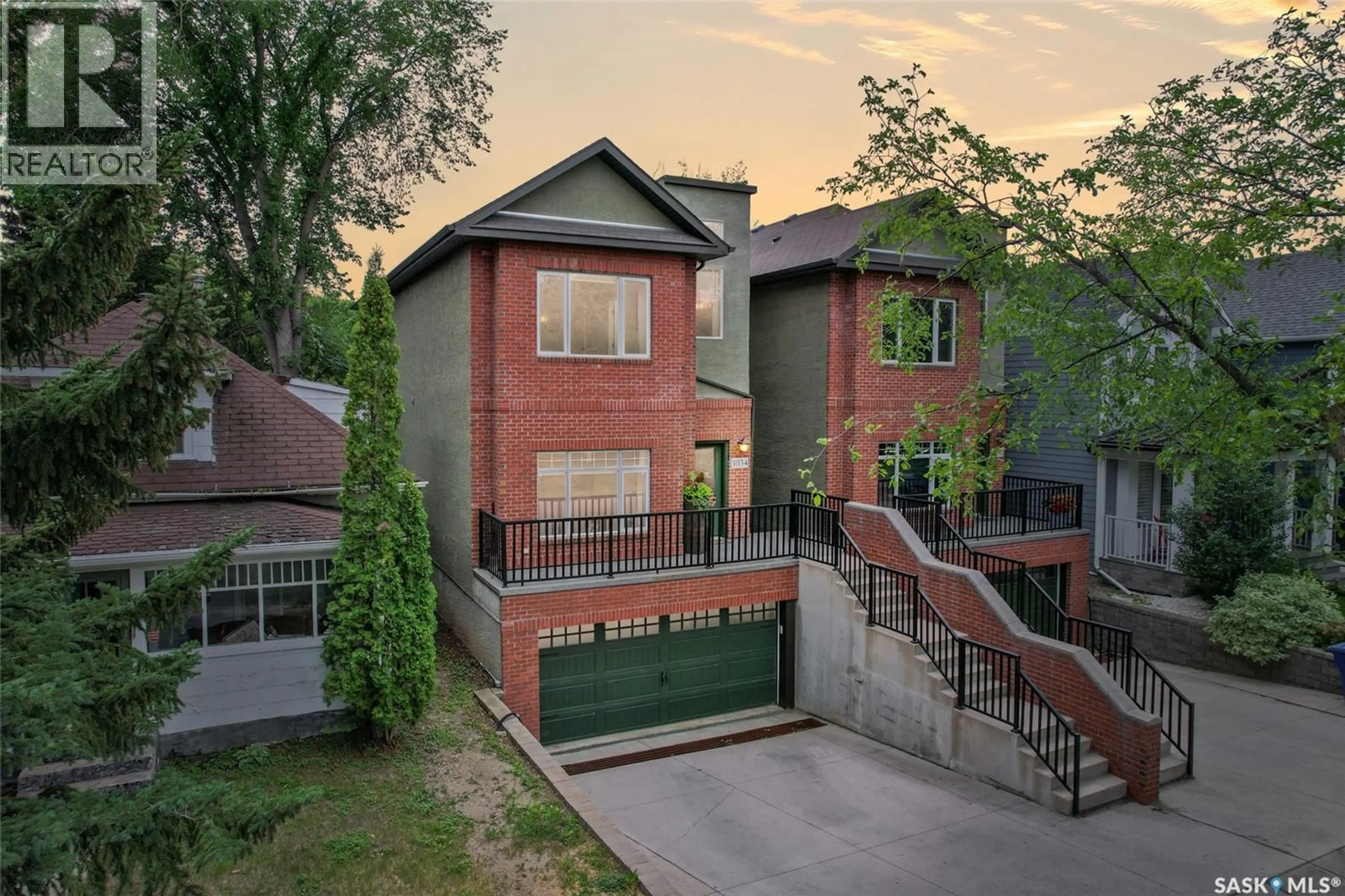 Home with brick exterior material, street for 1034 11TH STREET, Saskatoon Saskatchewan S7H0E9