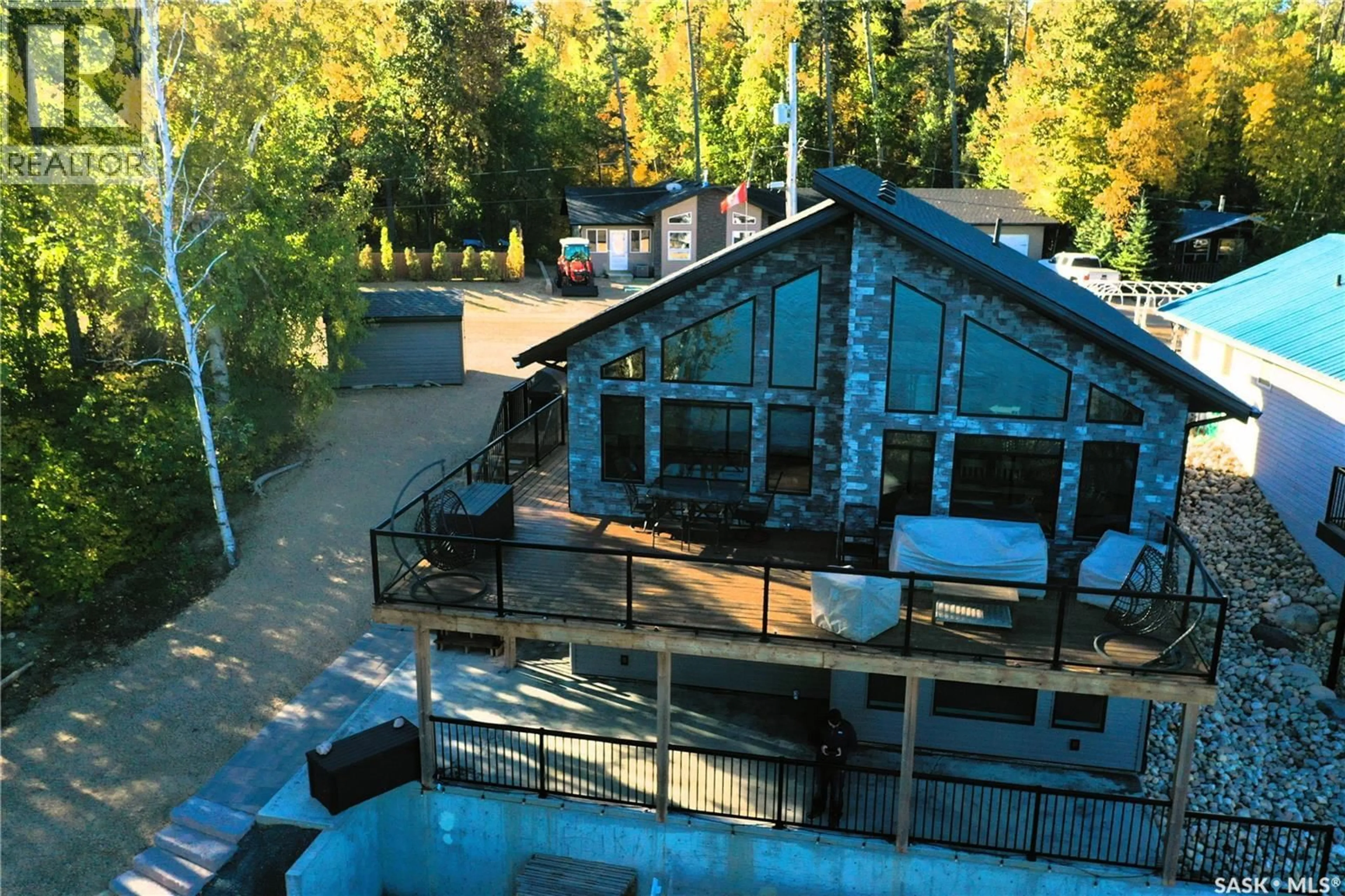 A pic from outside/outdoor area/front of a property/back of a property/a pic from drone, building for 1124 BIRCH AVENUE, Tobin Lake Saskatchewan S0E1E0
