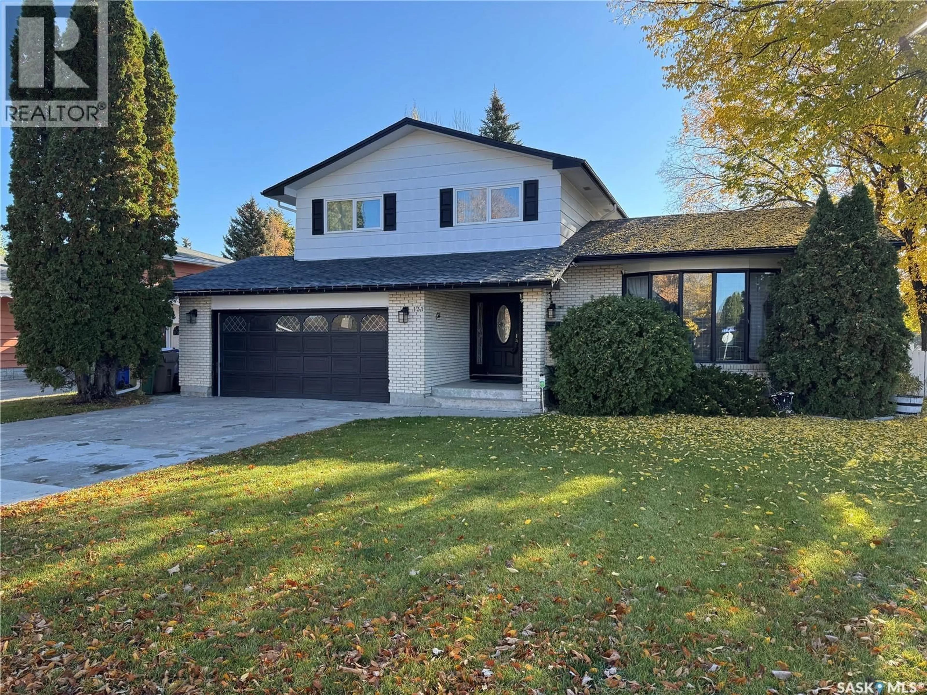 Home with brick exterior material, street for 131 WINDFIELD ROAD, Regina Saskatchewan S4V0E9
