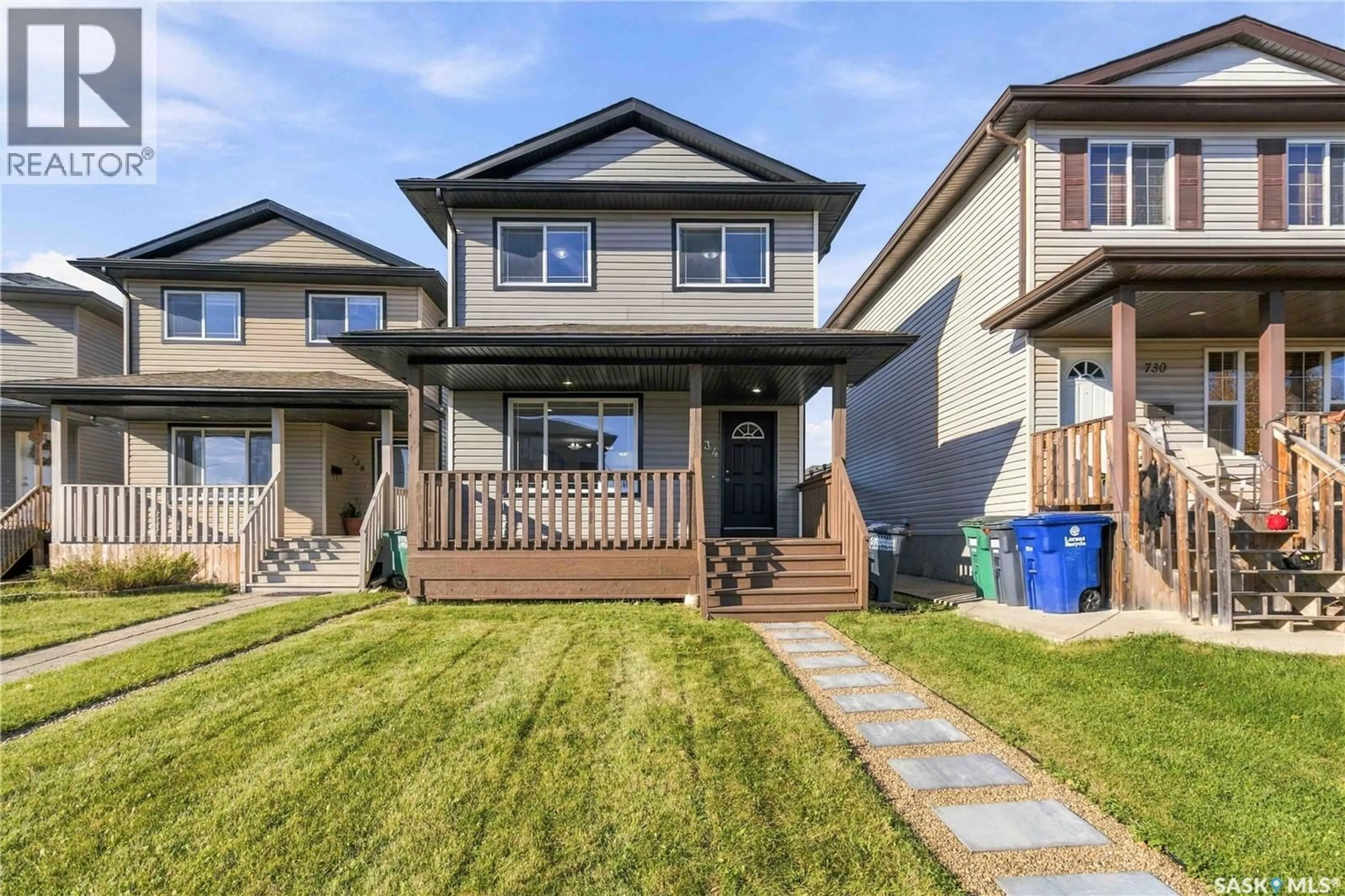 Home with vinyl exterior material, street for 734 LAMARSH LANE, Saskatoon Saskatchewan S0K4S3