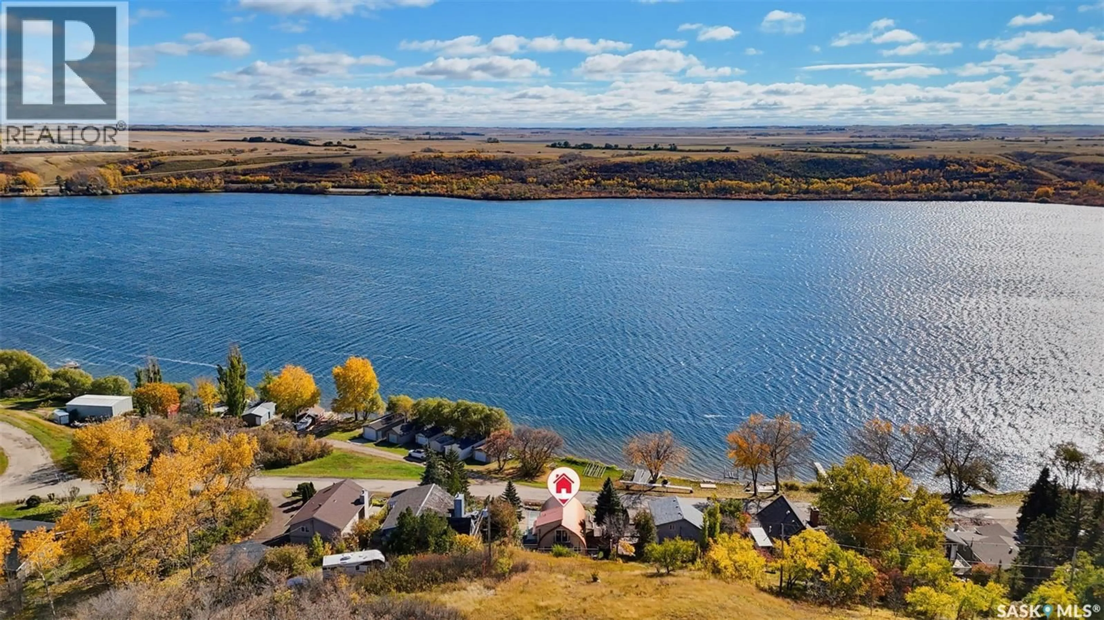 A pic from outside/outdoor area/front of a property/back of a property/a pic from drone, water/lake/river/ocean view for 11 SUMMERFELDT DRIVE, Thode Saskatchewan S0K1K0