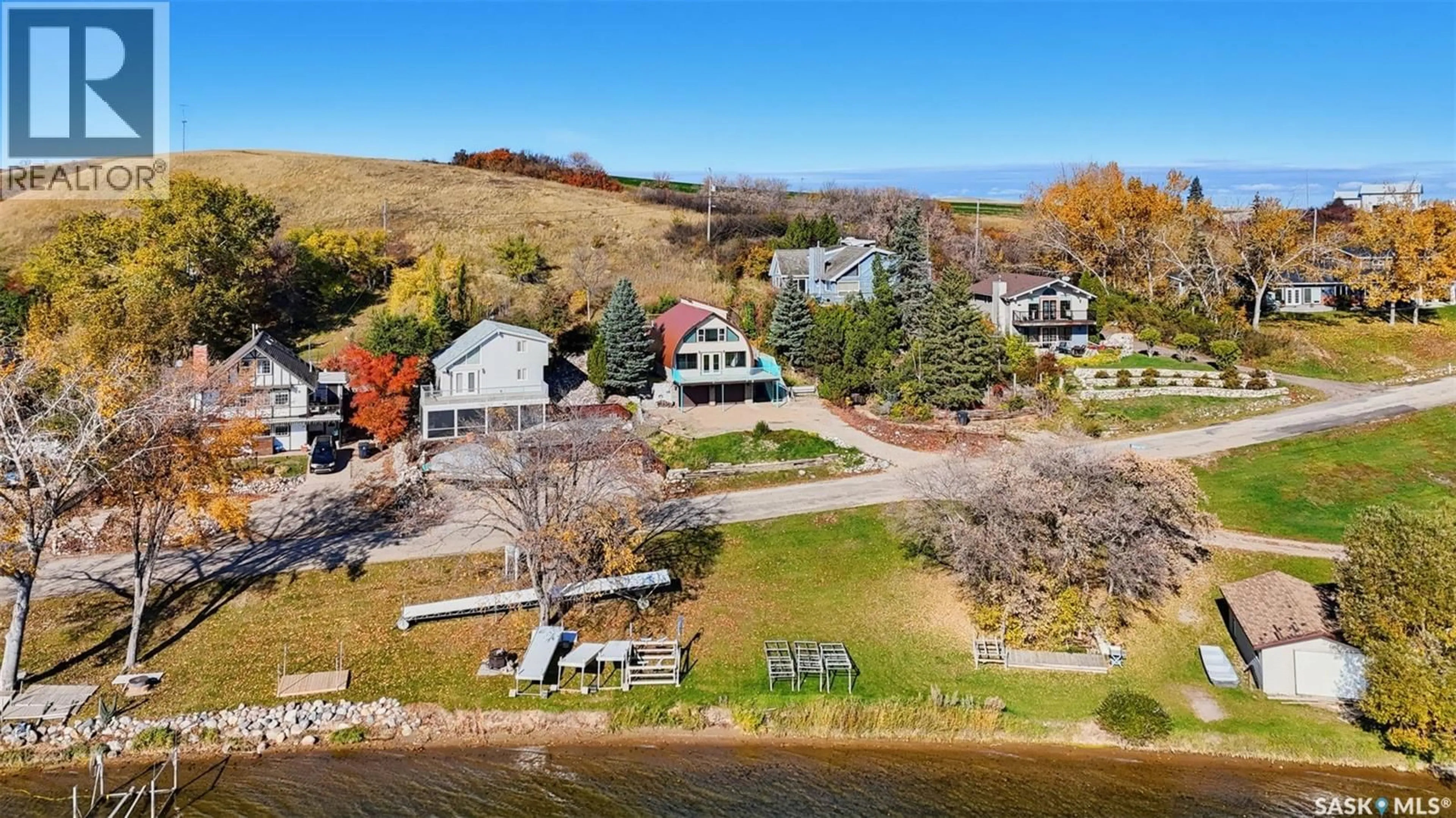 A pic from outside/outdoor area/front of a property/back of a property/a pic from drone, water/lake/river/ocean view for 11 SUMMERFELDT DRIVE, Thode Saskatchewan S0K1K0