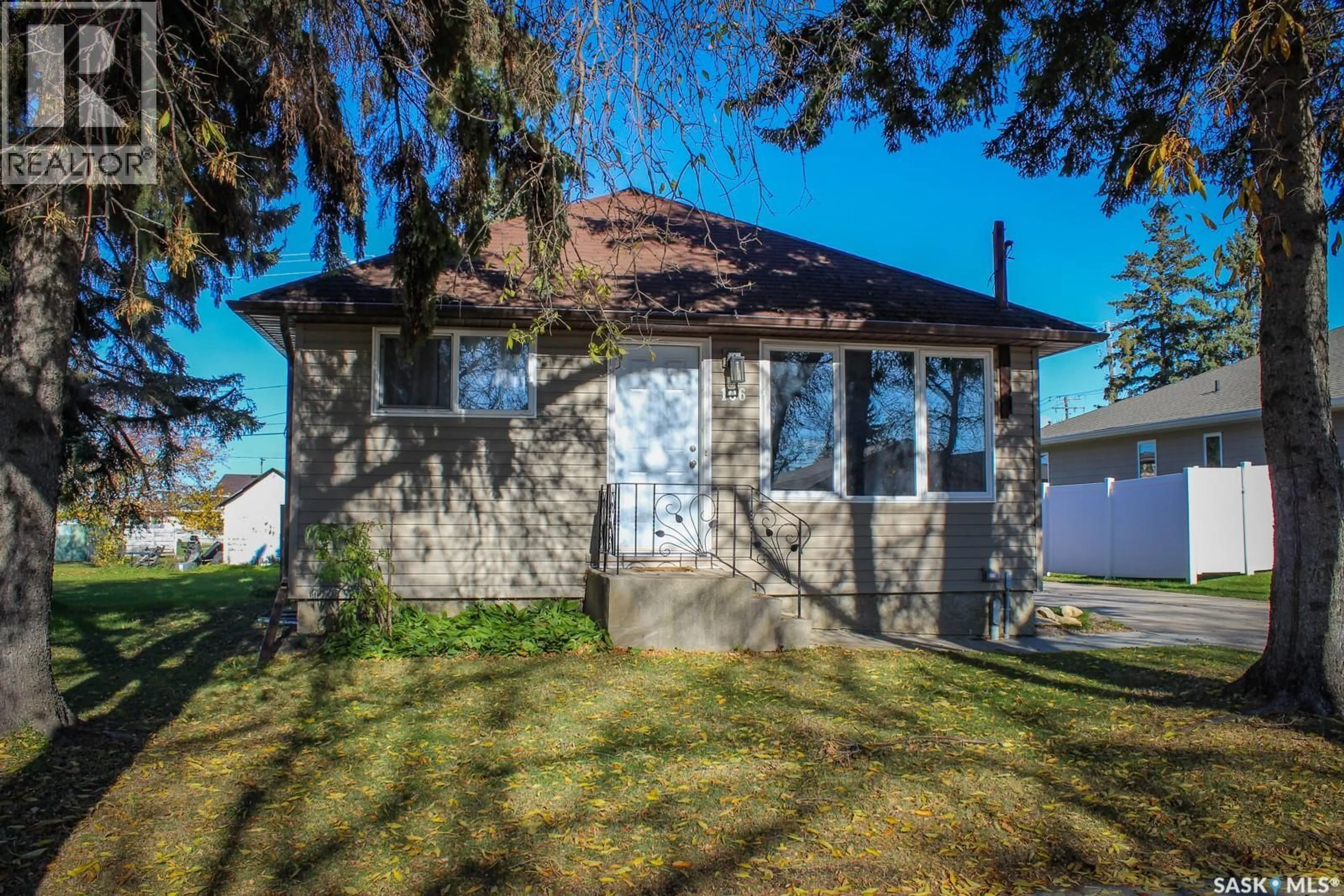 Home with vinyl exterior material, street for 106 HIGGINS AVENUE, Melfort Saskatchewan S0E1A0