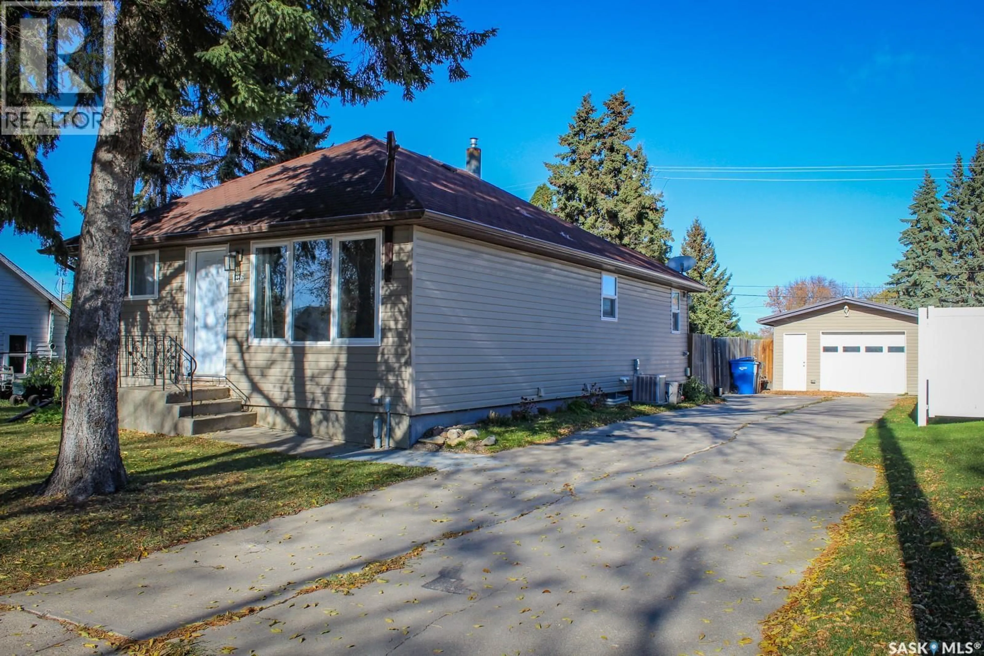 A pic from outside/outdoor area/front of a property/back of a property/a pic from drone, street for 106 HIGGINS AVENUE, Melfort Saskatchewan S0E1A0
