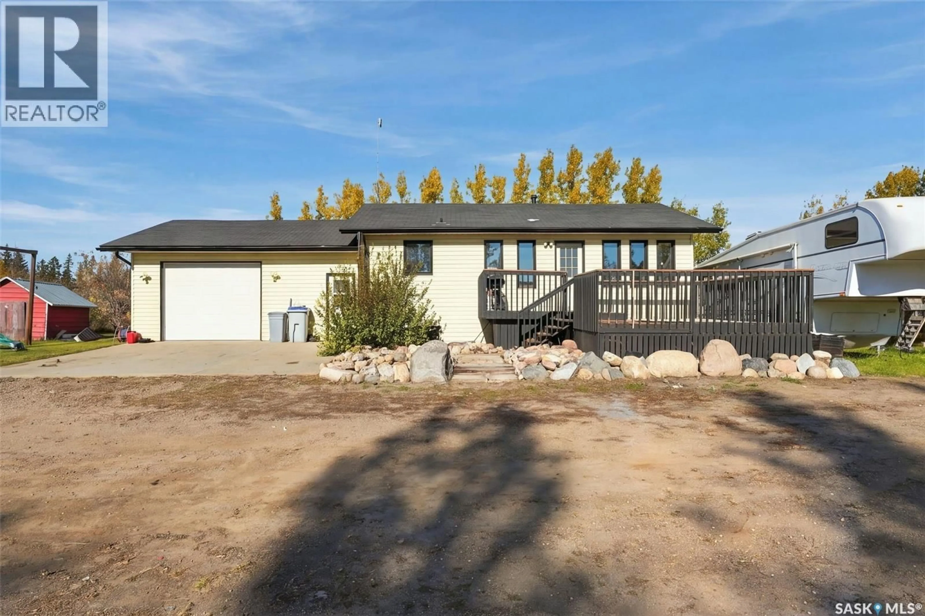 Home with vinyl exterior material, street for 10 LEONARD ACREAGE ACRES, Laird Rm No. 404 Saskatchewan S0K4R0