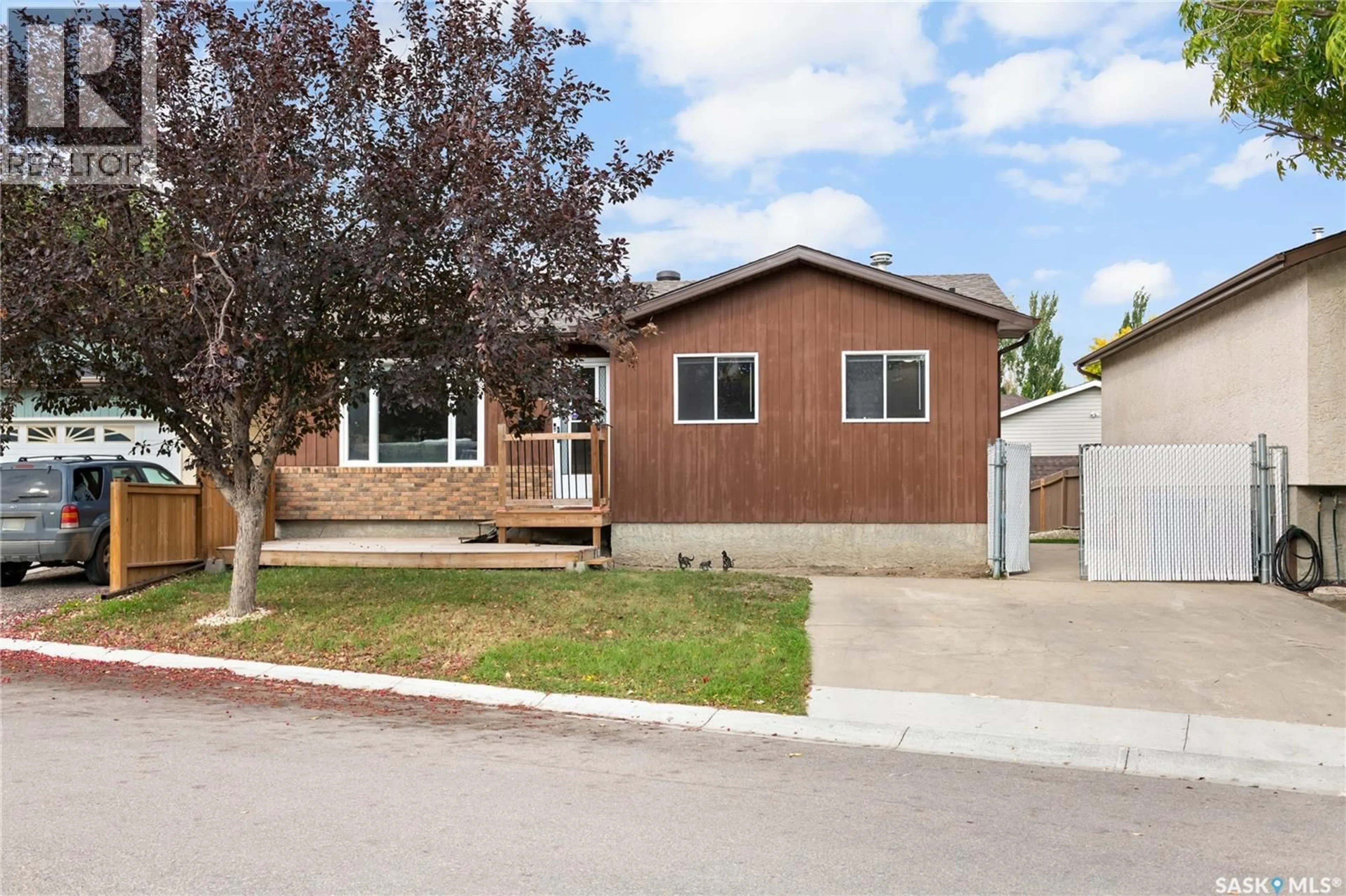 Home with vinyl exterior material, street for 7110 LANIGAN DRIVE, Regina Saskatchewan S4X3Y1