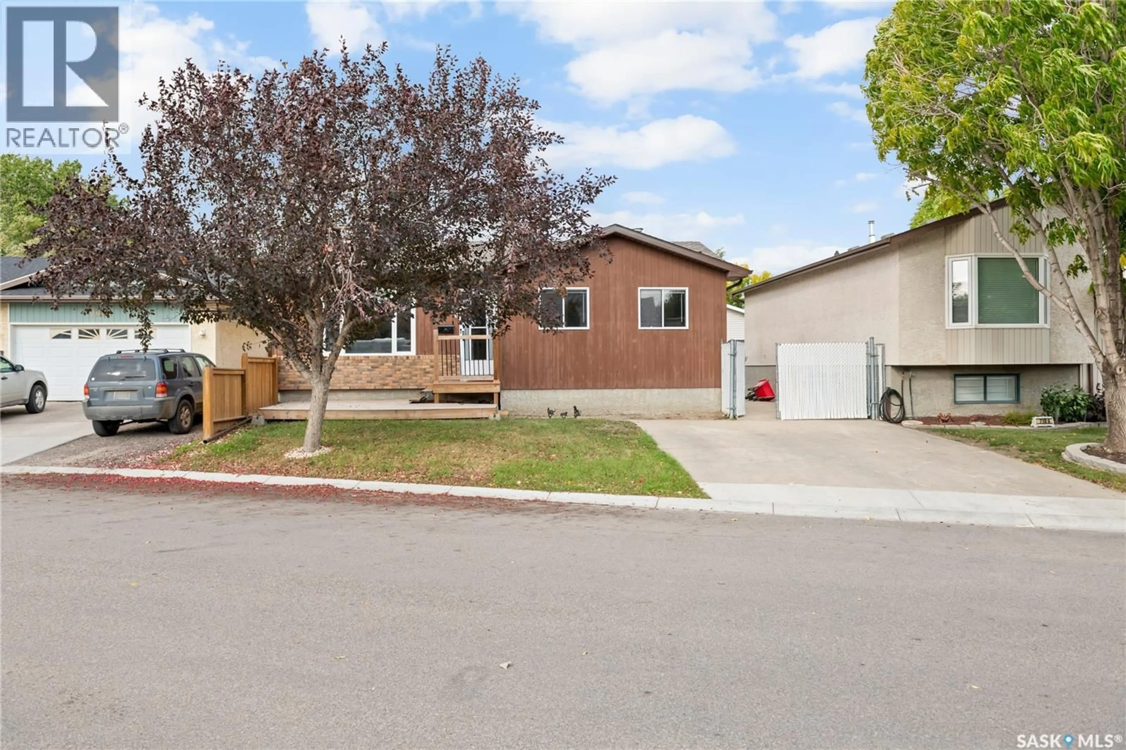 Home with vinyl exterior material, street for 7110 LANIGAN DRIVE, Regina Saskatchewan S4X3Y1