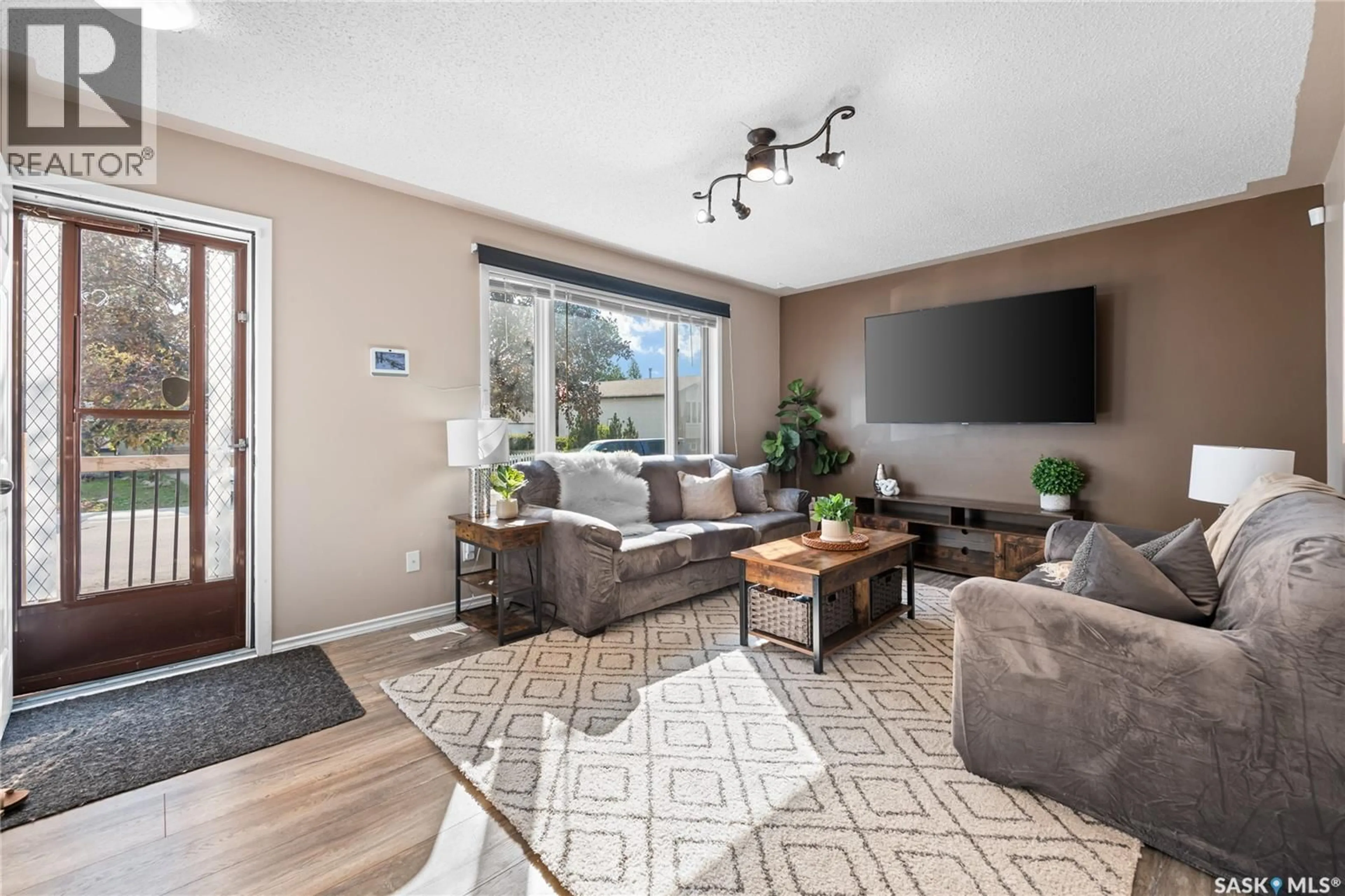 Living room with furniture, unknown for 7110 LANIGAN DRIVE, Regina Saskatchewan S4X3Y1