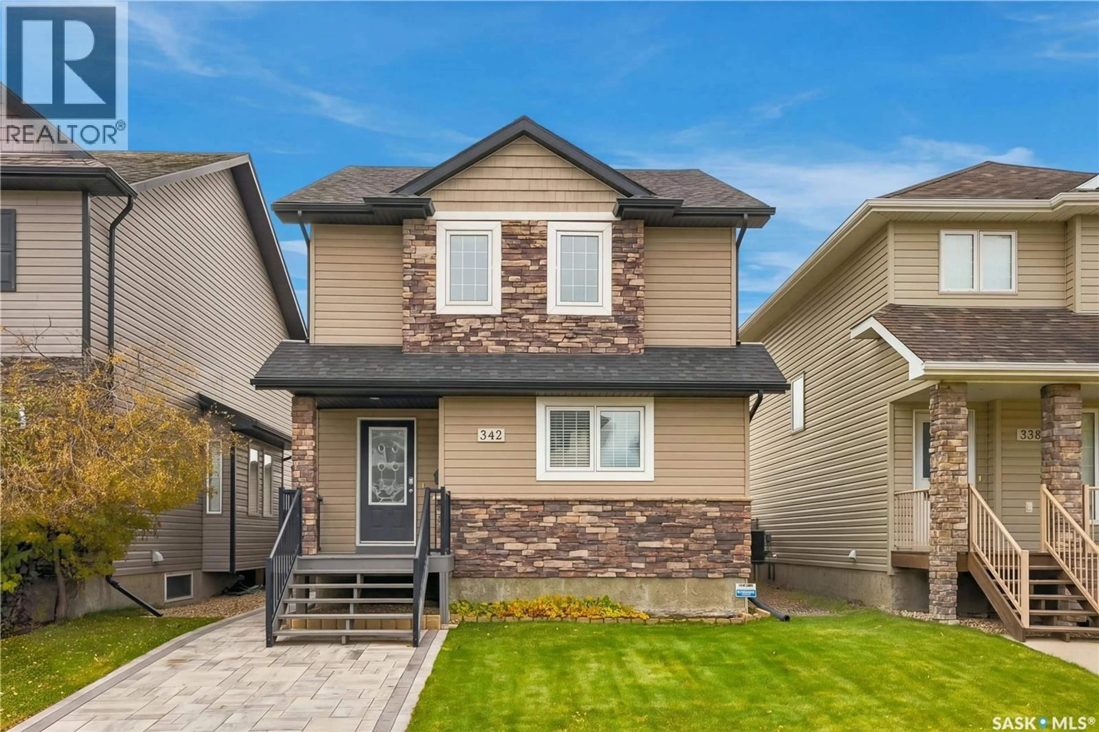 Home with vinyl exterior material, street for 342 LYND LANE, Saskatoon Saskatchewan S7T0B1