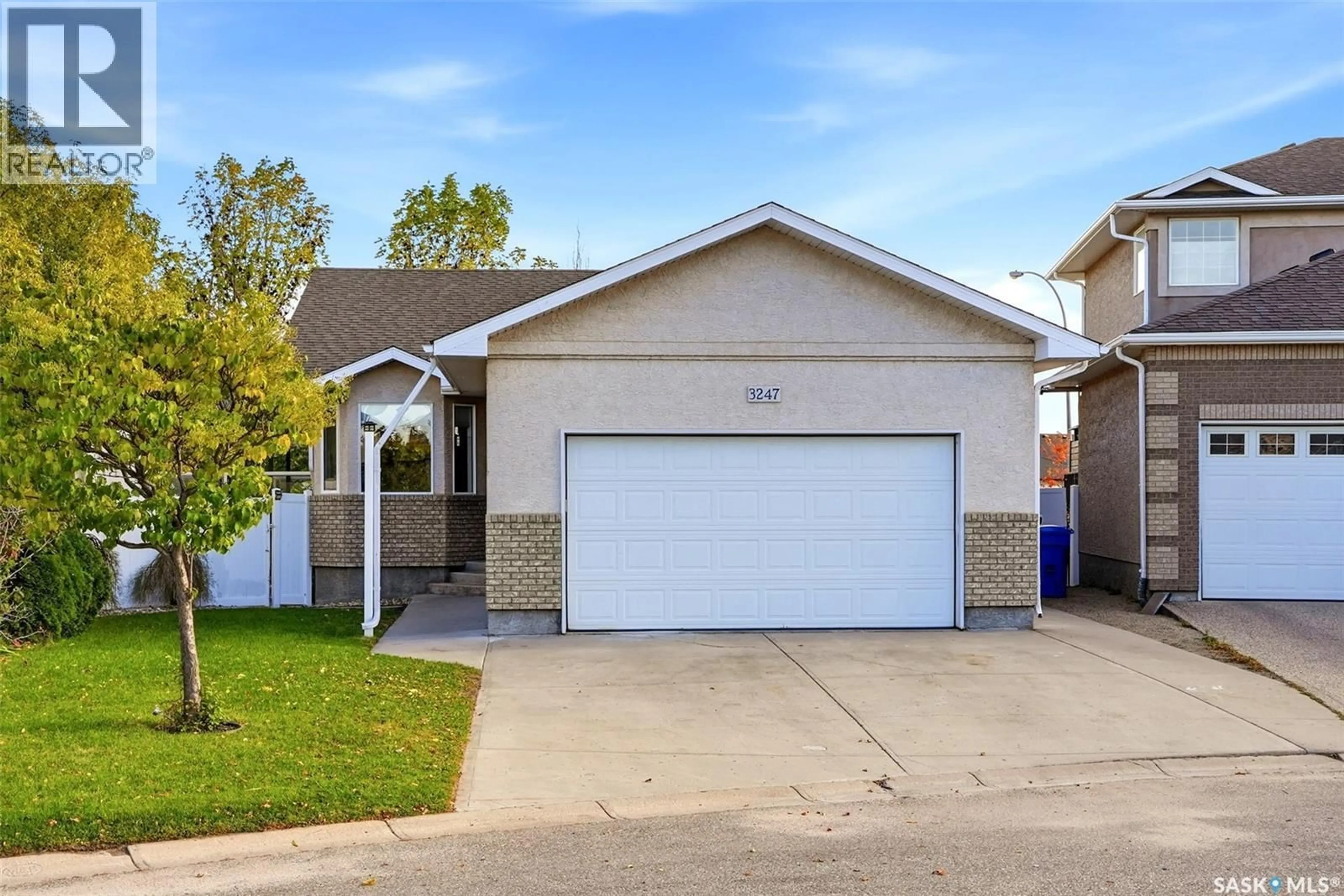 Home with vinyl exterior material, street for 3247 WINDSOR PARK PLACE, Regina Saskatchewan S4V3B2