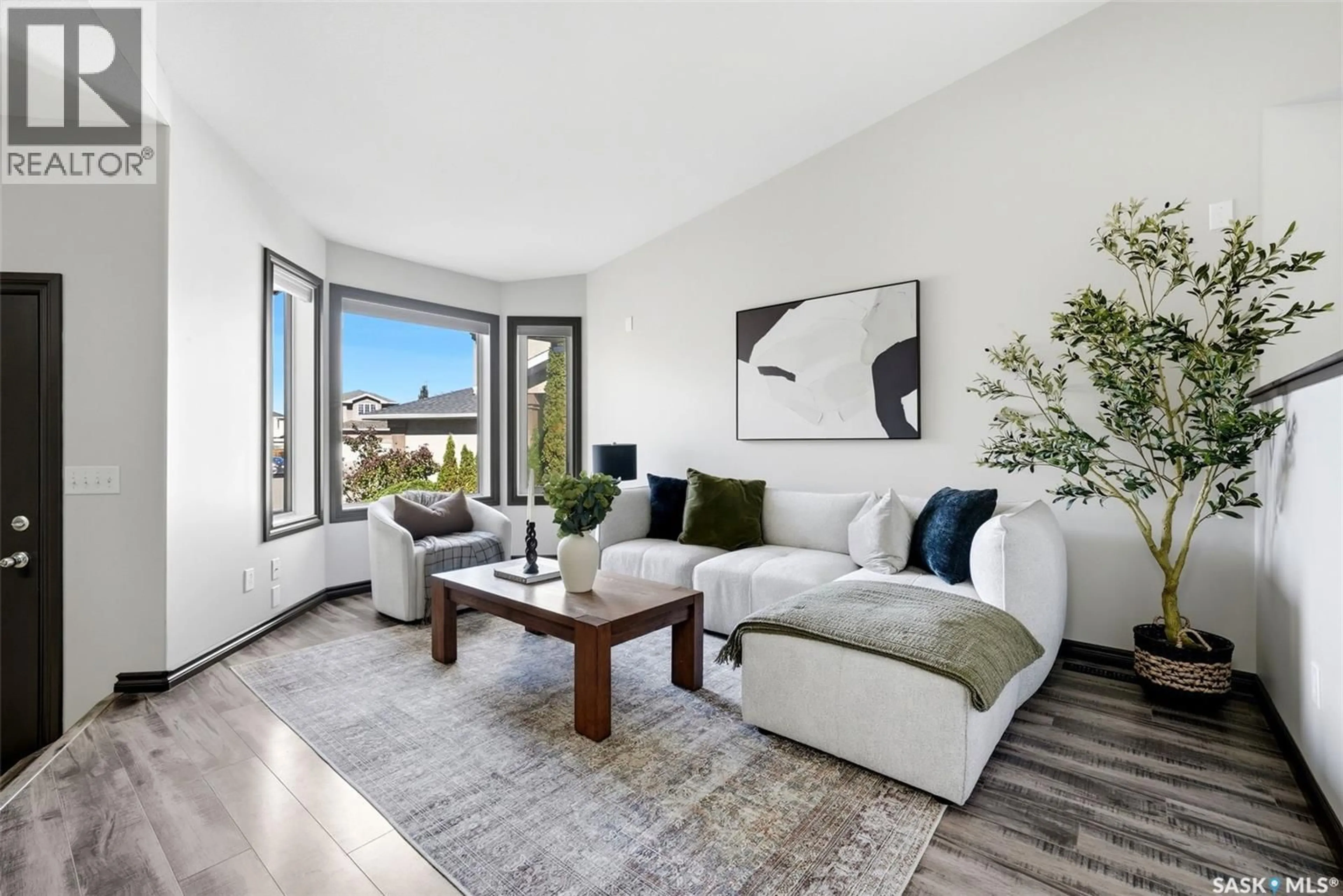 Living room with furniture, unknown for 3247 WINDSOR PARK PLACE, Regina Saskatchewan S4V3B2