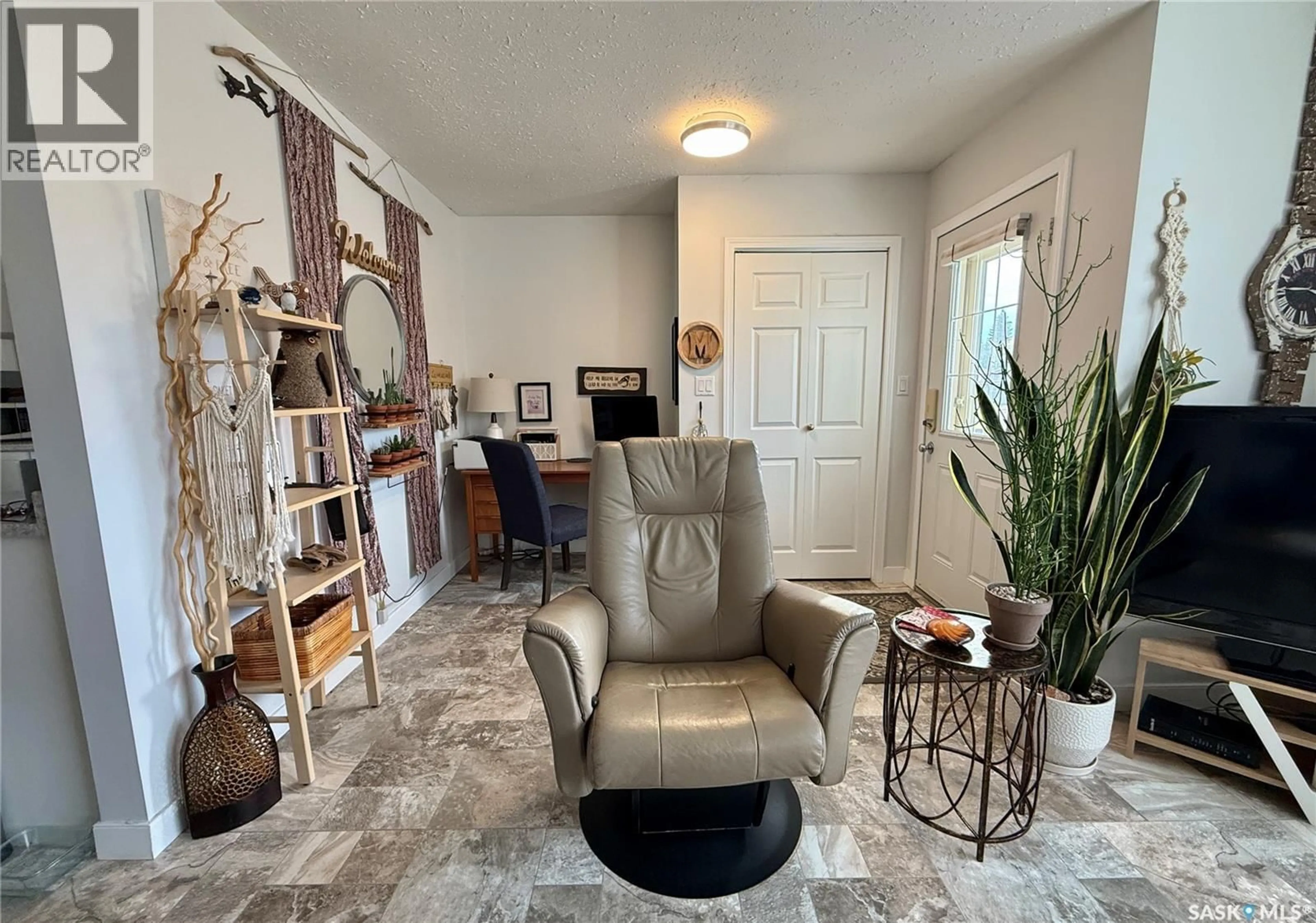 Living room with furniture, unknown for B 112 21ST STREET, Battleford Saskatchewan S0M0E0