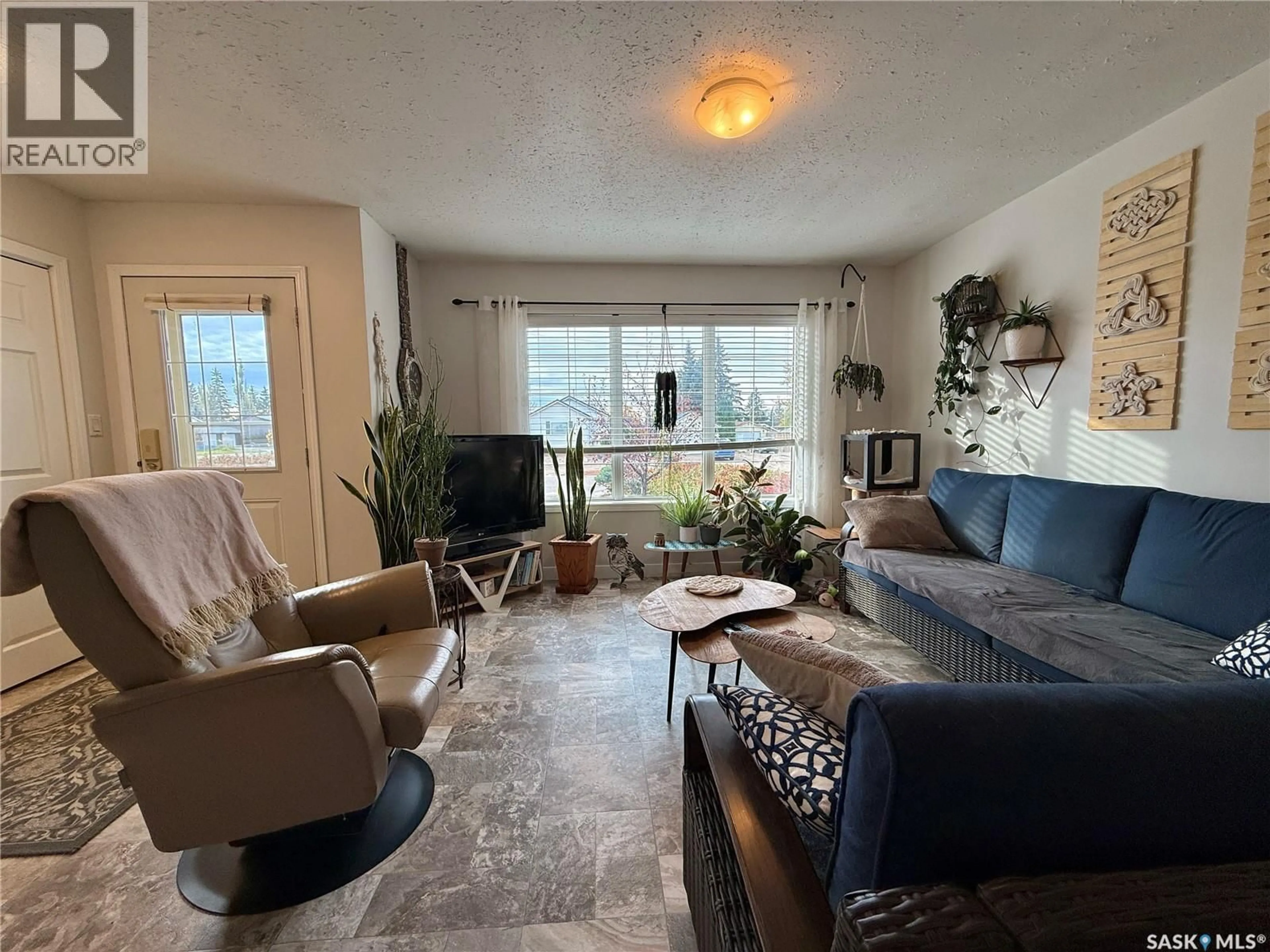 Living room with furniture, unknown for B 112 21ST STREET, Battleford Saskatchewan S0M0E0