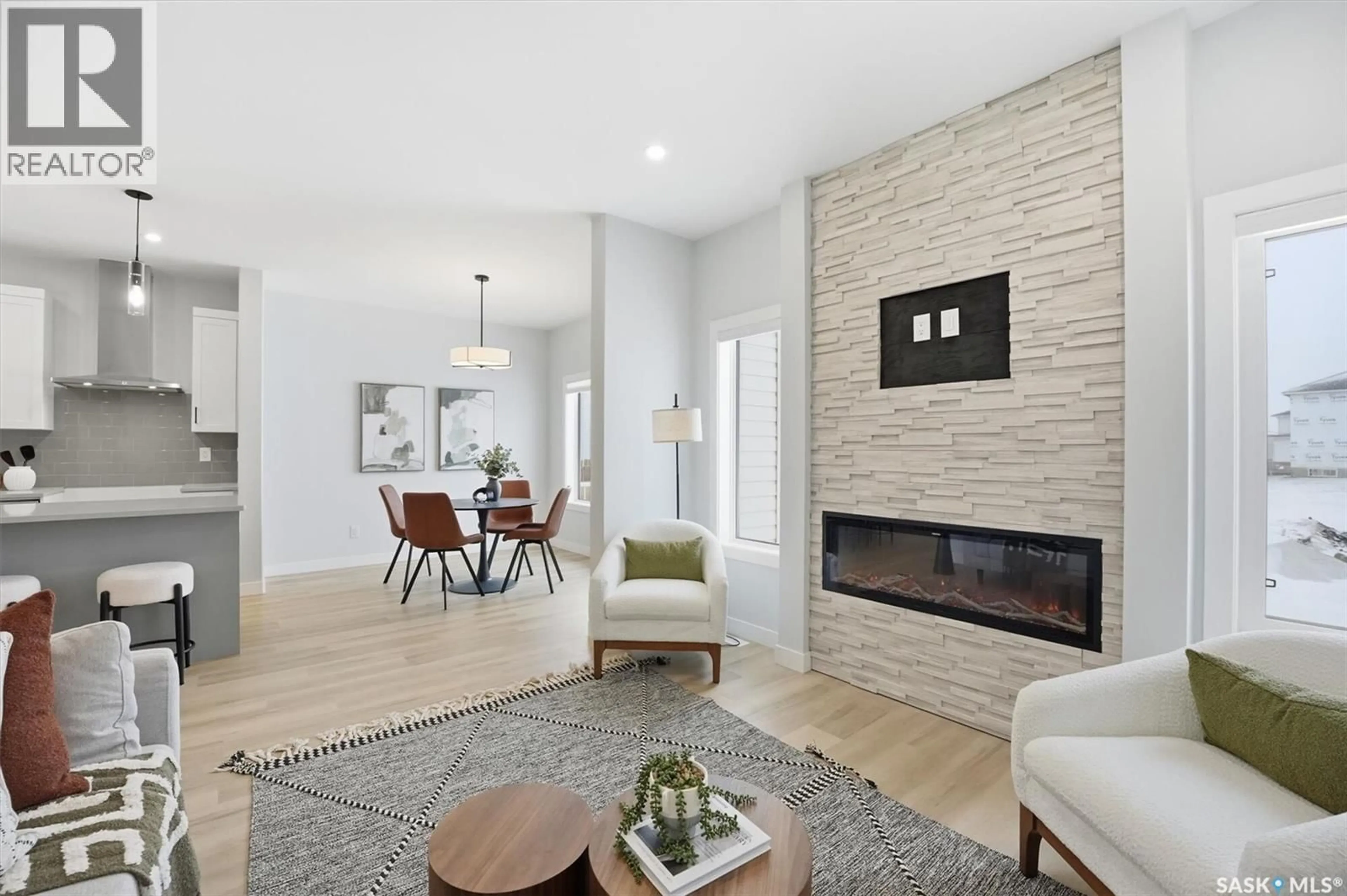 Living room with furniture, ceramic/tile floor for 4920 PADWICK ROAD, Regina Saskatchewan S4W0V5