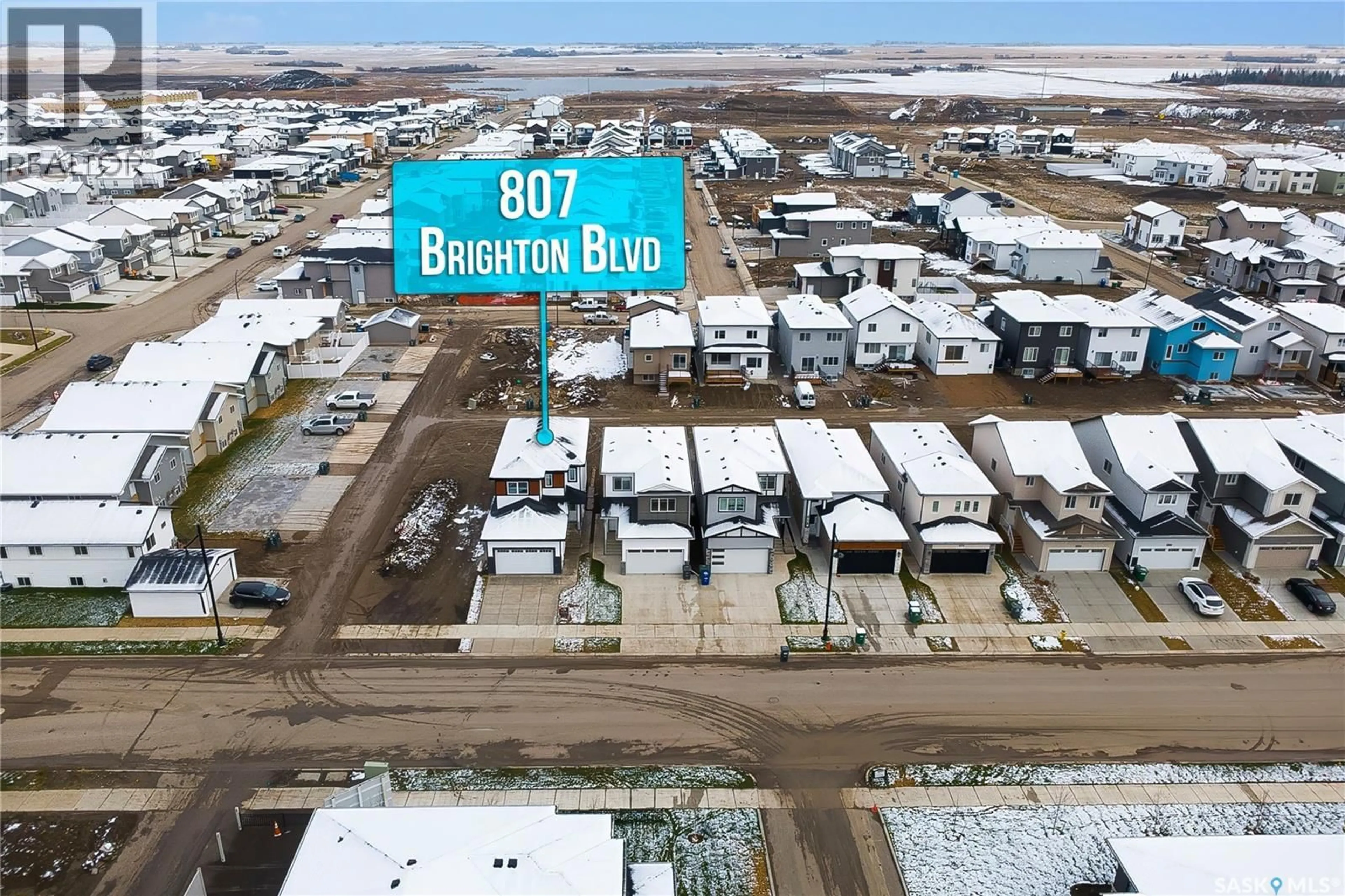 A pic from outside/outdoor area/front of a property/back of a property/a pic from drone, street for 807 BRIGHTON BOULEVARD, Saskatoon Saskatchewan S7V1X8