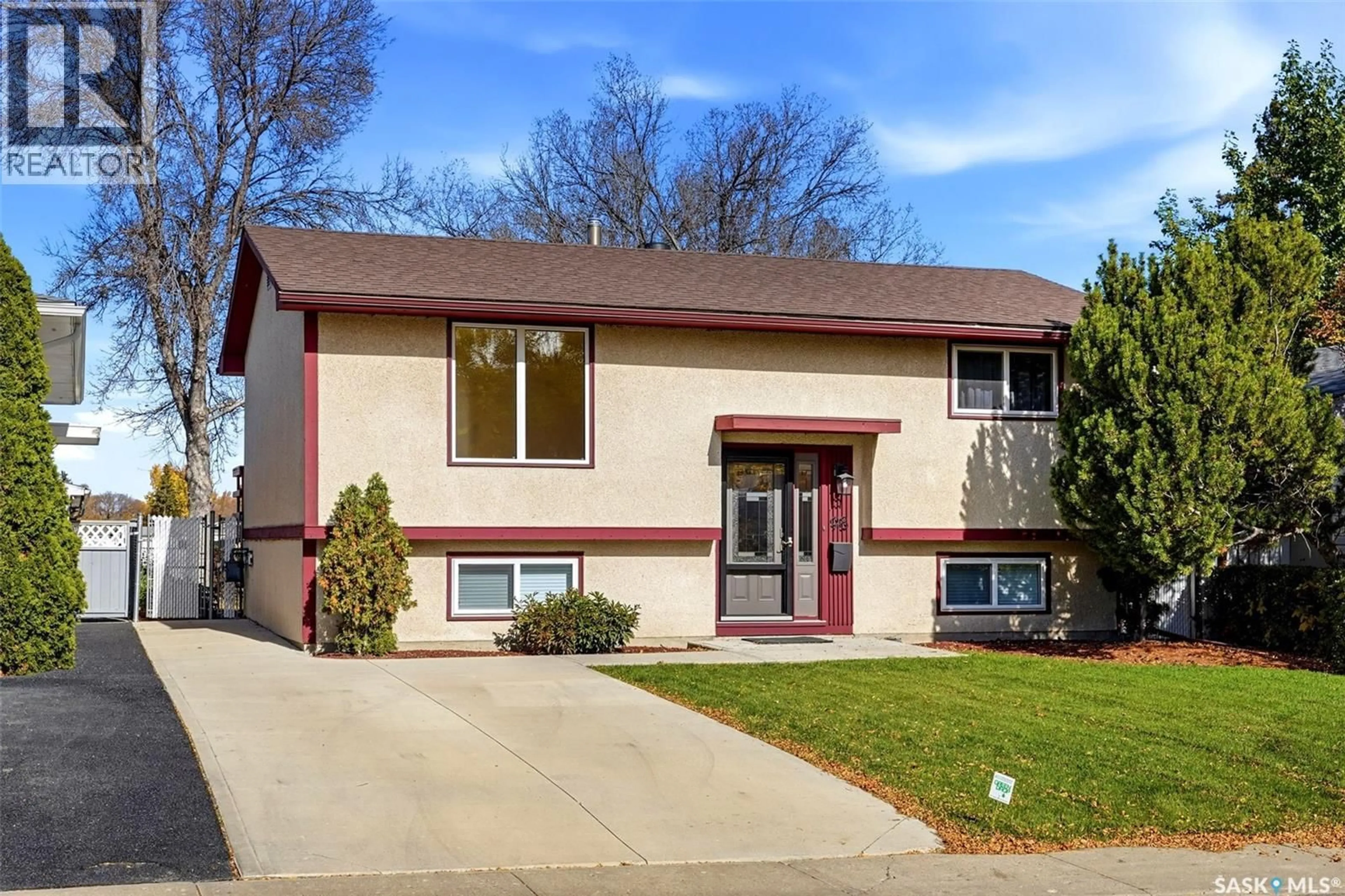 Home with vinyl exterior material, street for 98 READ AVENUE, Regina Saskatchewan S4T6P8