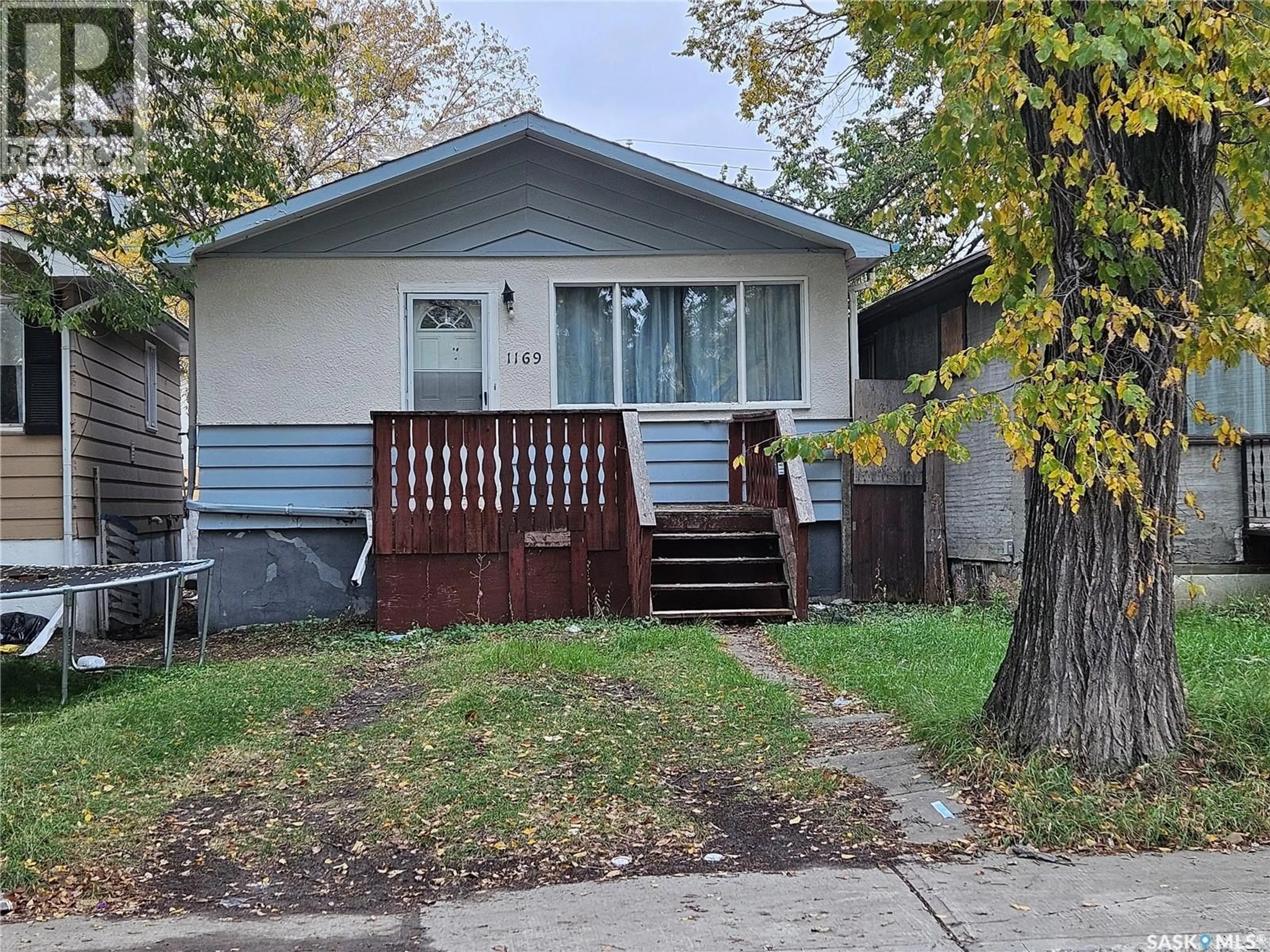 Home with vinyl exterior material, street for 1169 CAMERON STREET, Regina Saskatchewan S4T2S9