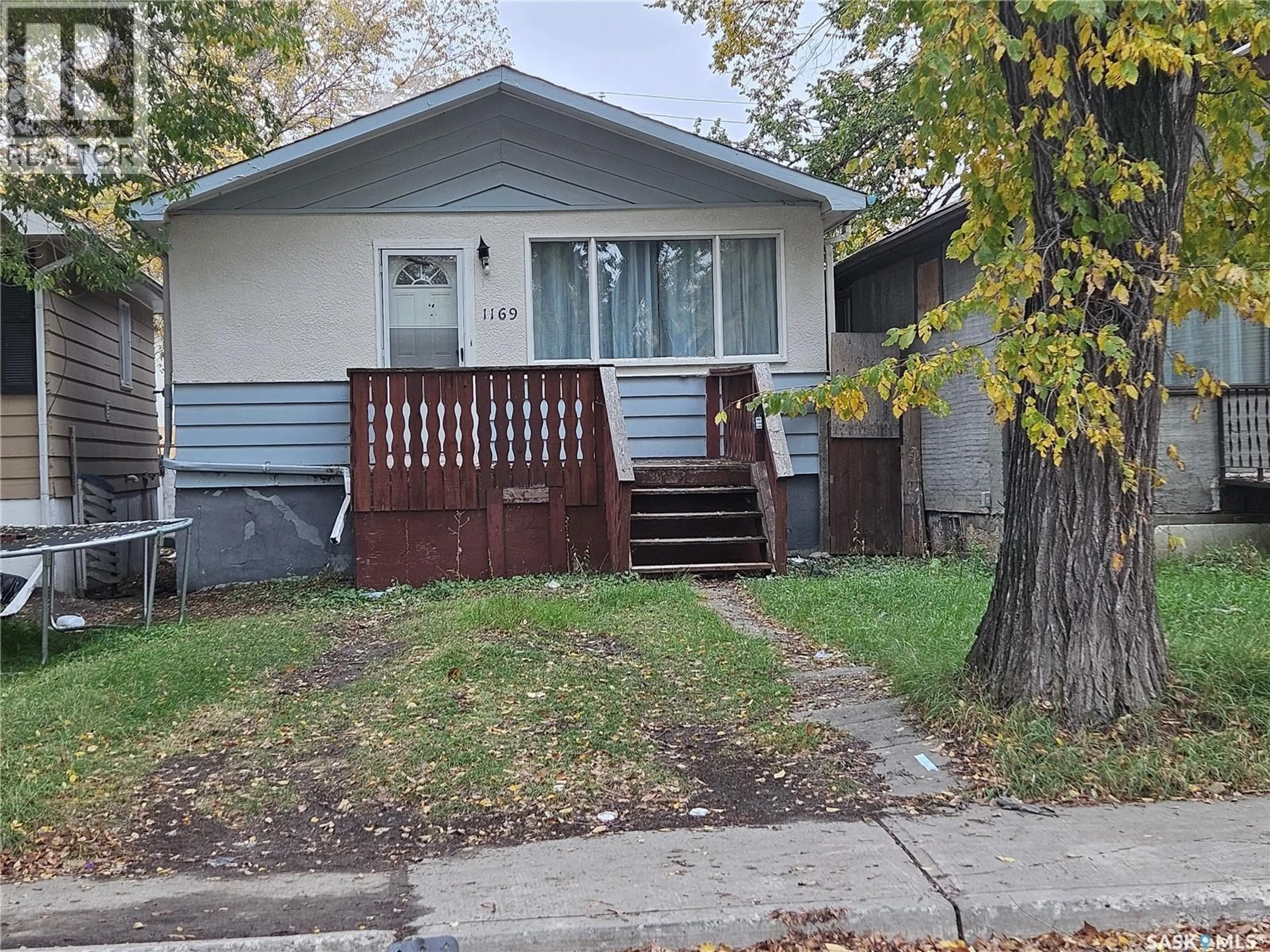 Home with vinyl exterior material, street for 1169 CAMERON STREET, Regina Saskatchewan S4T2S9