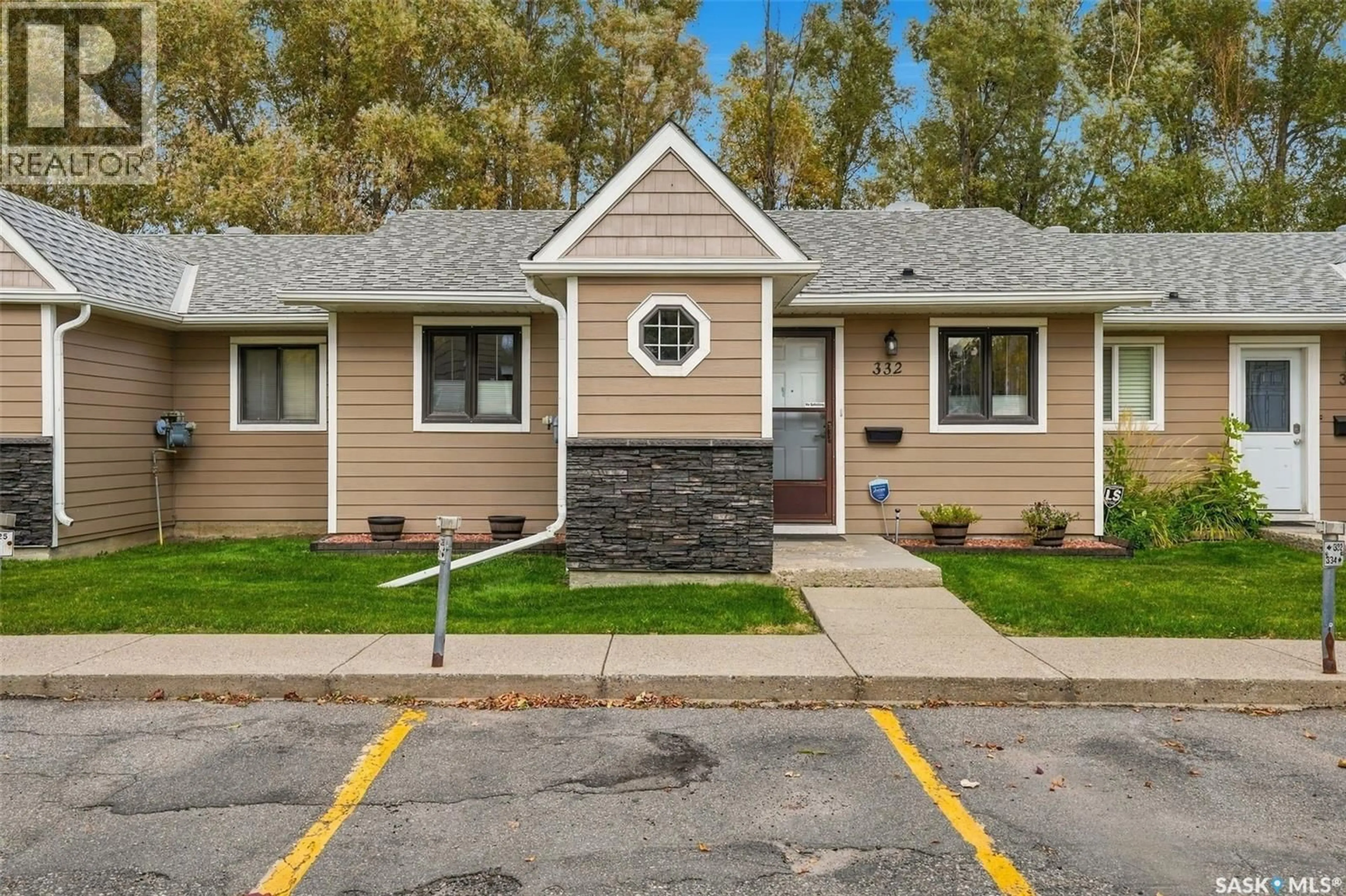 Home with vinyl exterior material, street for 332 CEDAR MEADOW DRIVE, Regina Saskatchewan S4X3J5