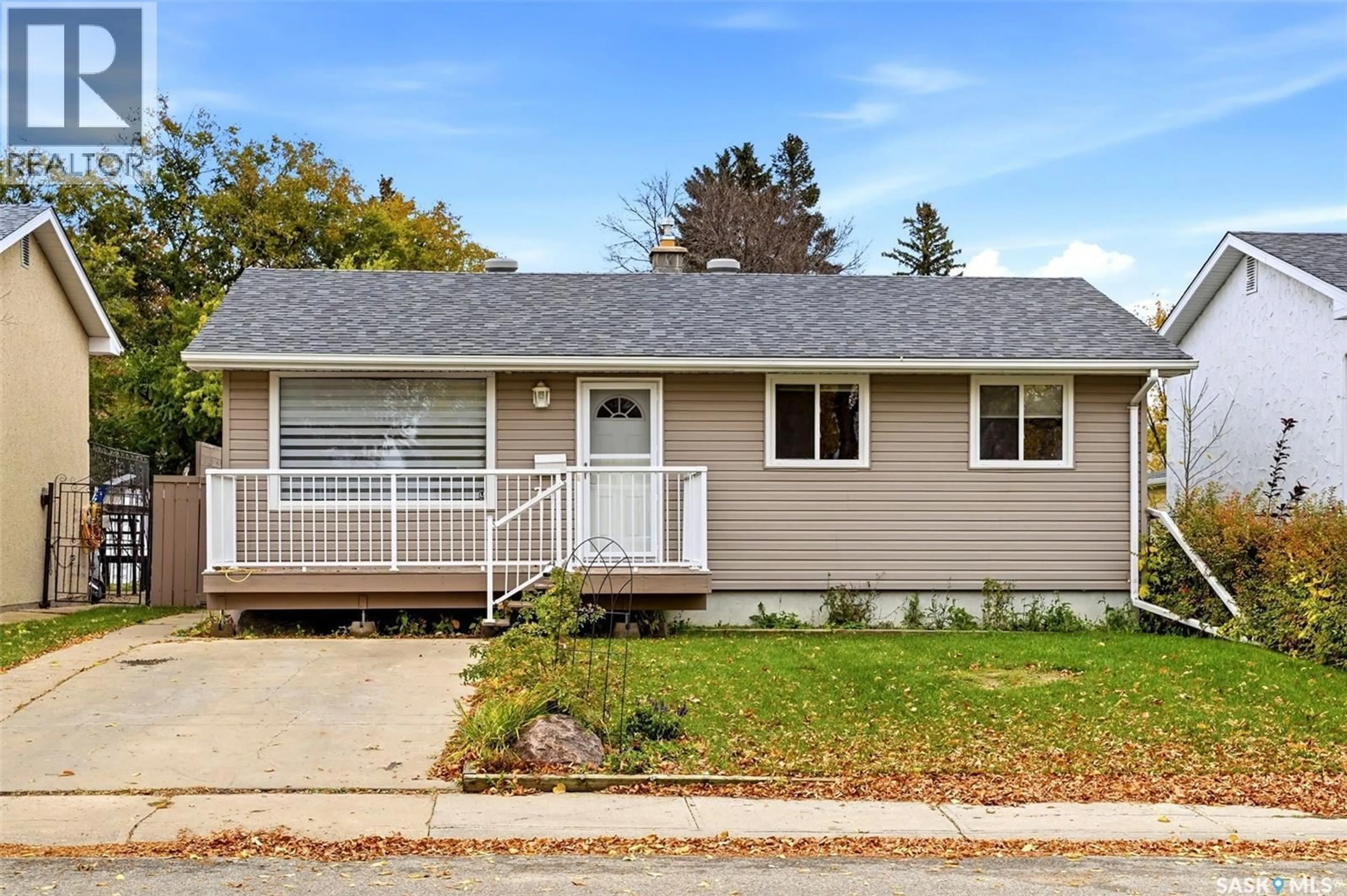 Home with vinyl exterior material, street for 747 SNEDDON STREET, Regina Saskatchewan S4T6H3