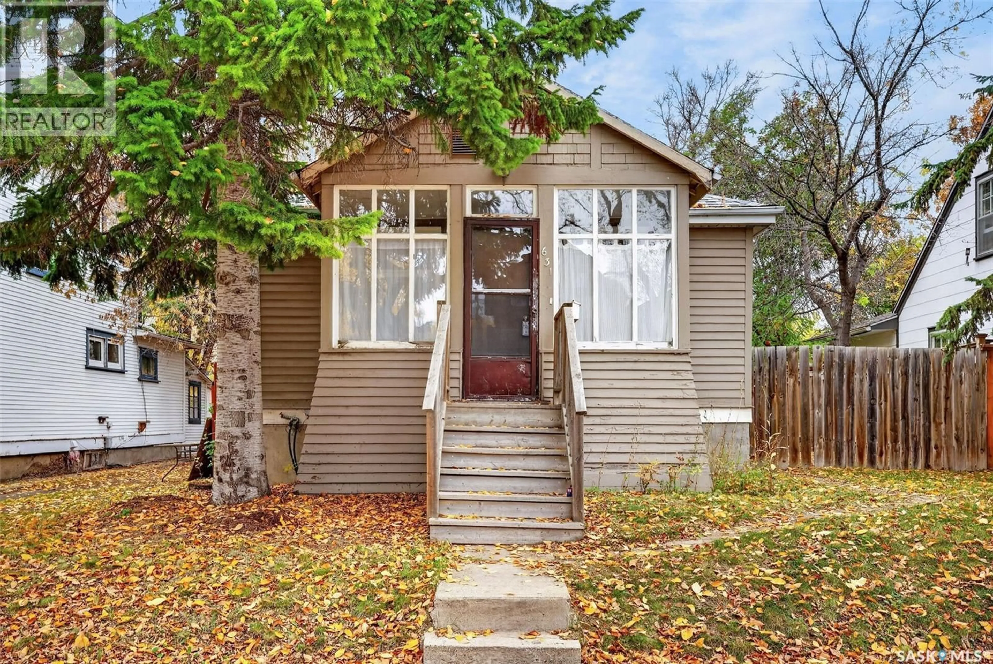 Home with vinyl exterior material, street for 631 7TH STREET, Saskatoon Saskatchewan S7X0X8