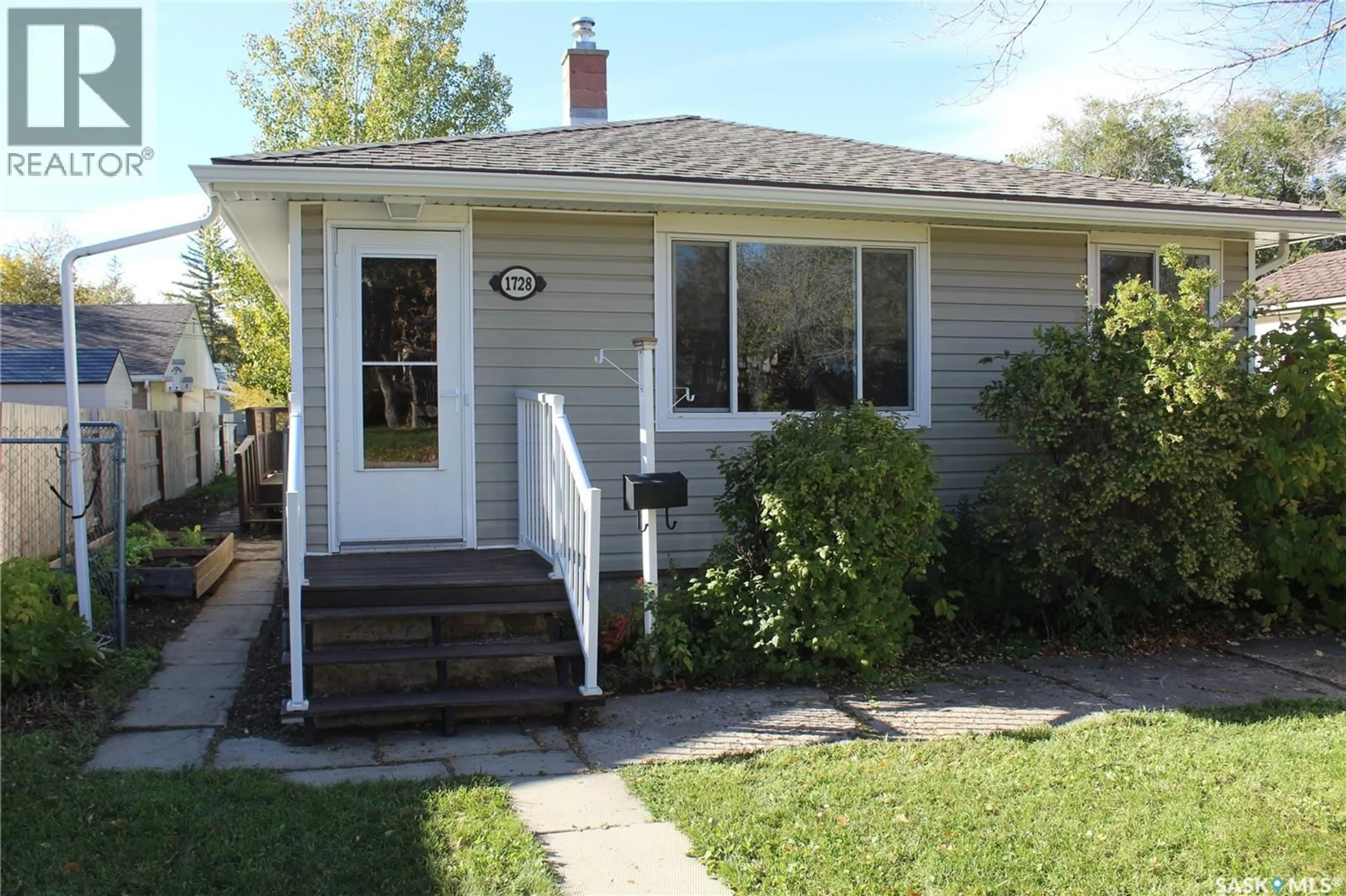 Home with vinyl exterior material, street for 1728 CONNAUGHT STREET, Regina Saskatchewan S4T4T2