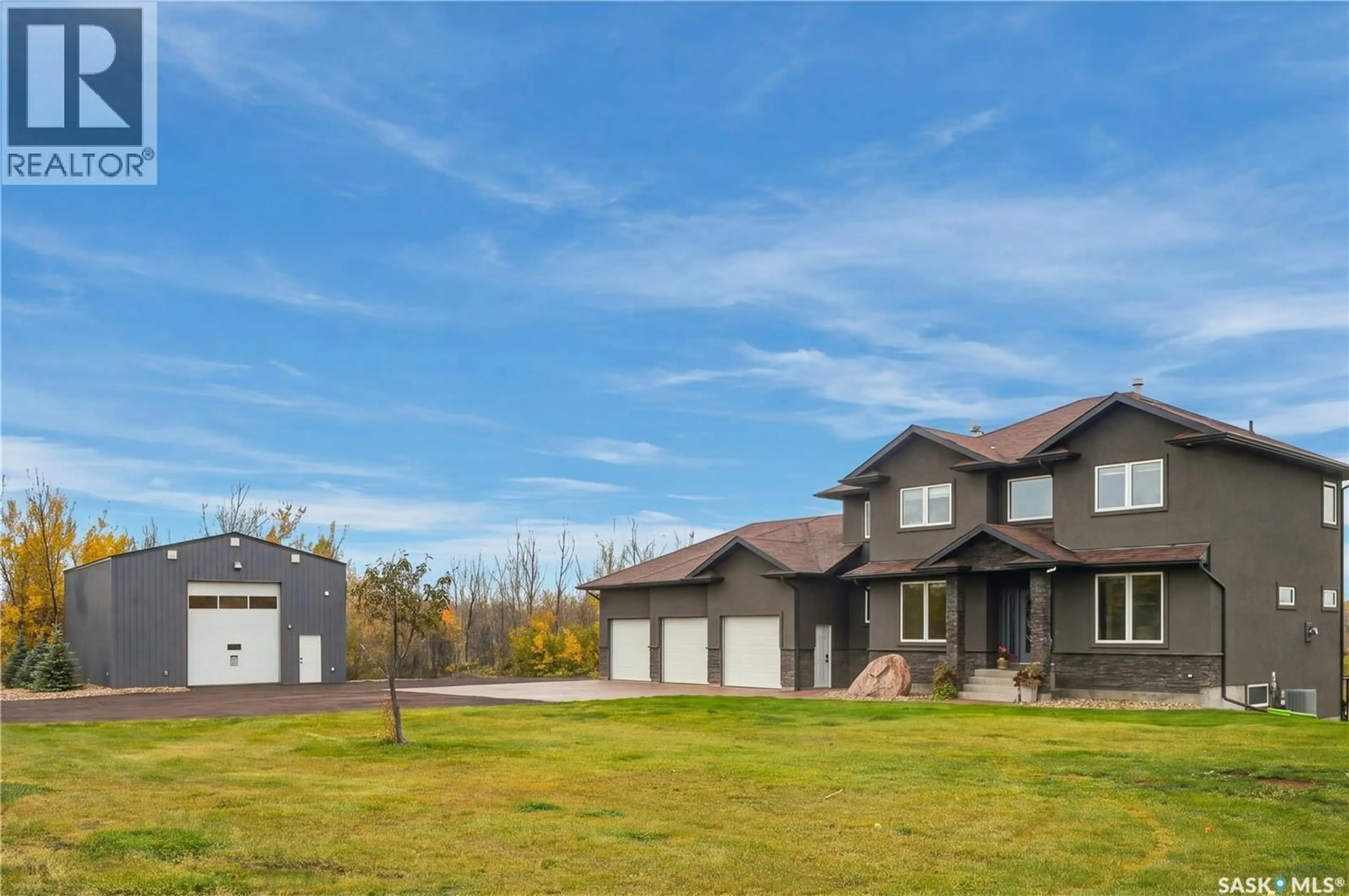 A pic from outside/outdoor area/front of a property/back of a property/a pic from drone, unknown for 3 HIDDEN RIDGE ROAD, Corman Park Rm No. 344 Saskatchewan S7K3J8