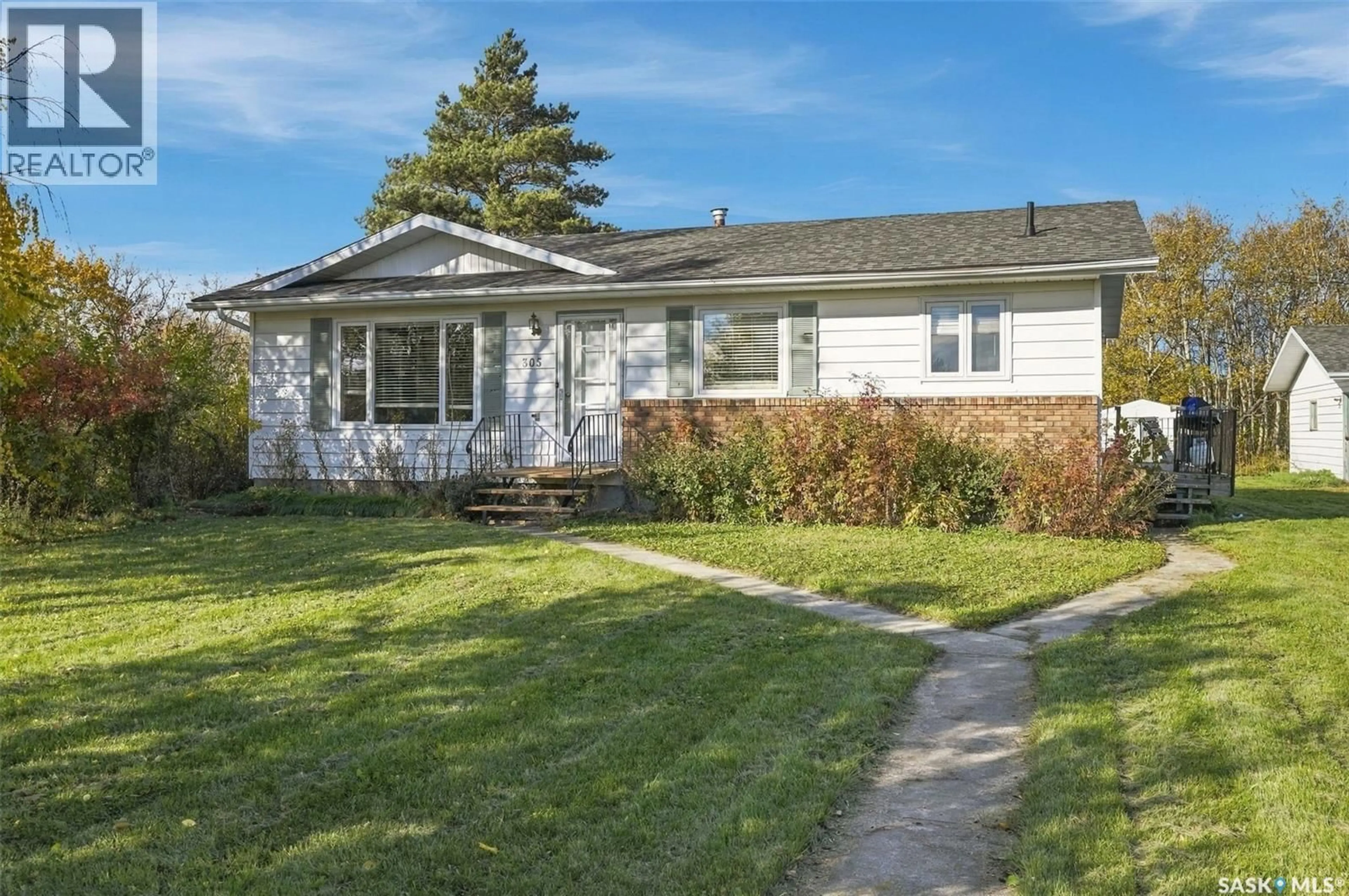 Home with vinyl exterior material, street for 305 3RD AVE, Edenwold Saskatchewan S0G1K0