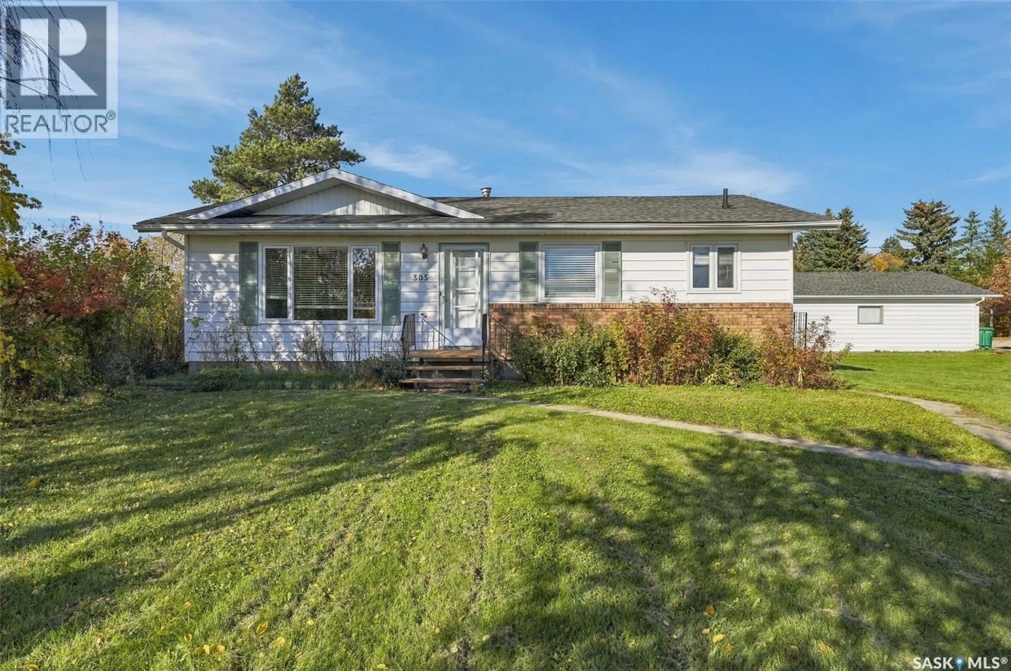 Home with vinyl exterior material, street for 305 3RD AVE, Edenwold Saskatchewan S0G1K0