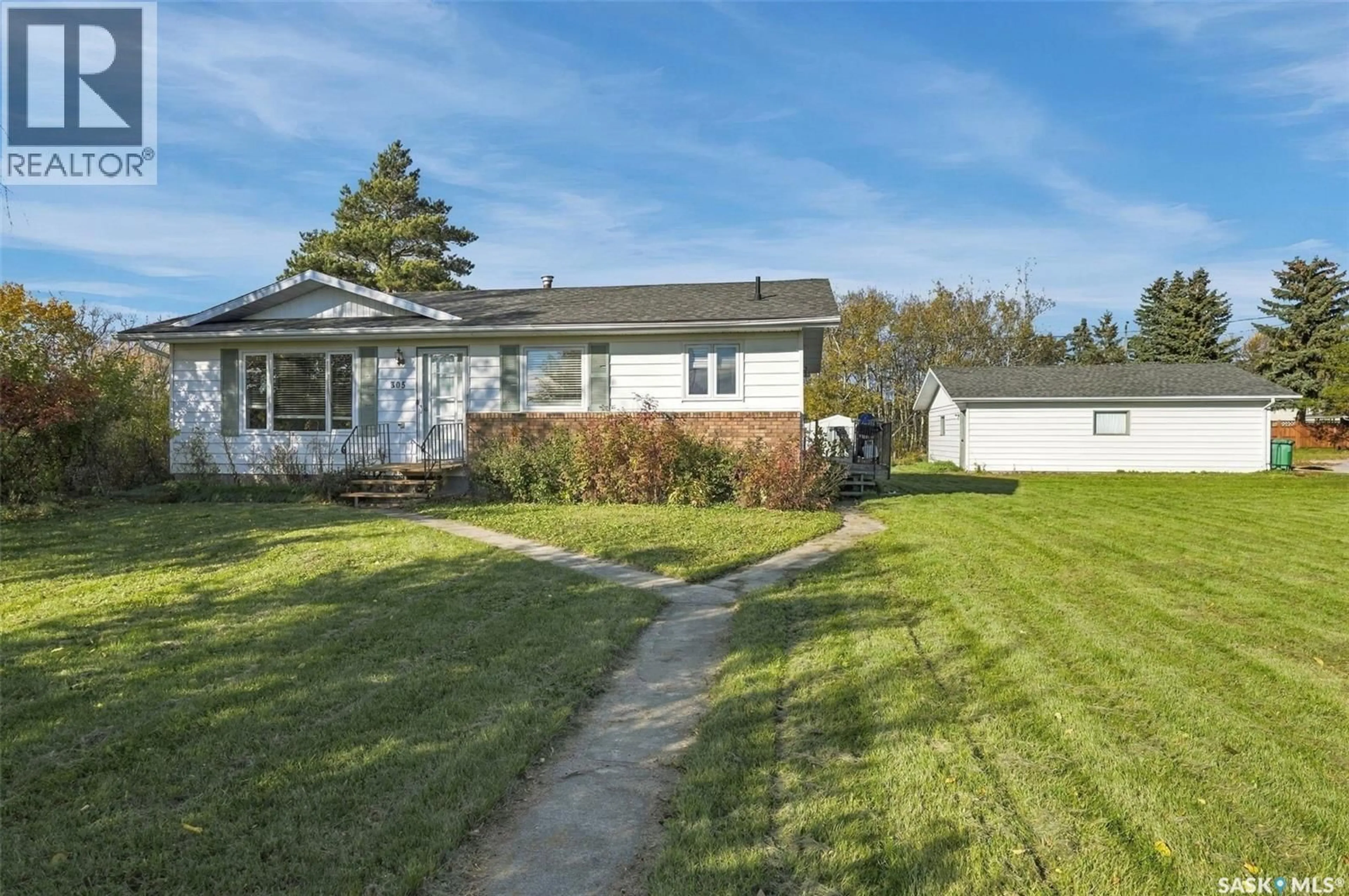 A pic from outside/outdoor area/front of a property/back of a property/a pic from drone, street for 305 3RD AVE, Edenwold Saskatchewan S0G1K0