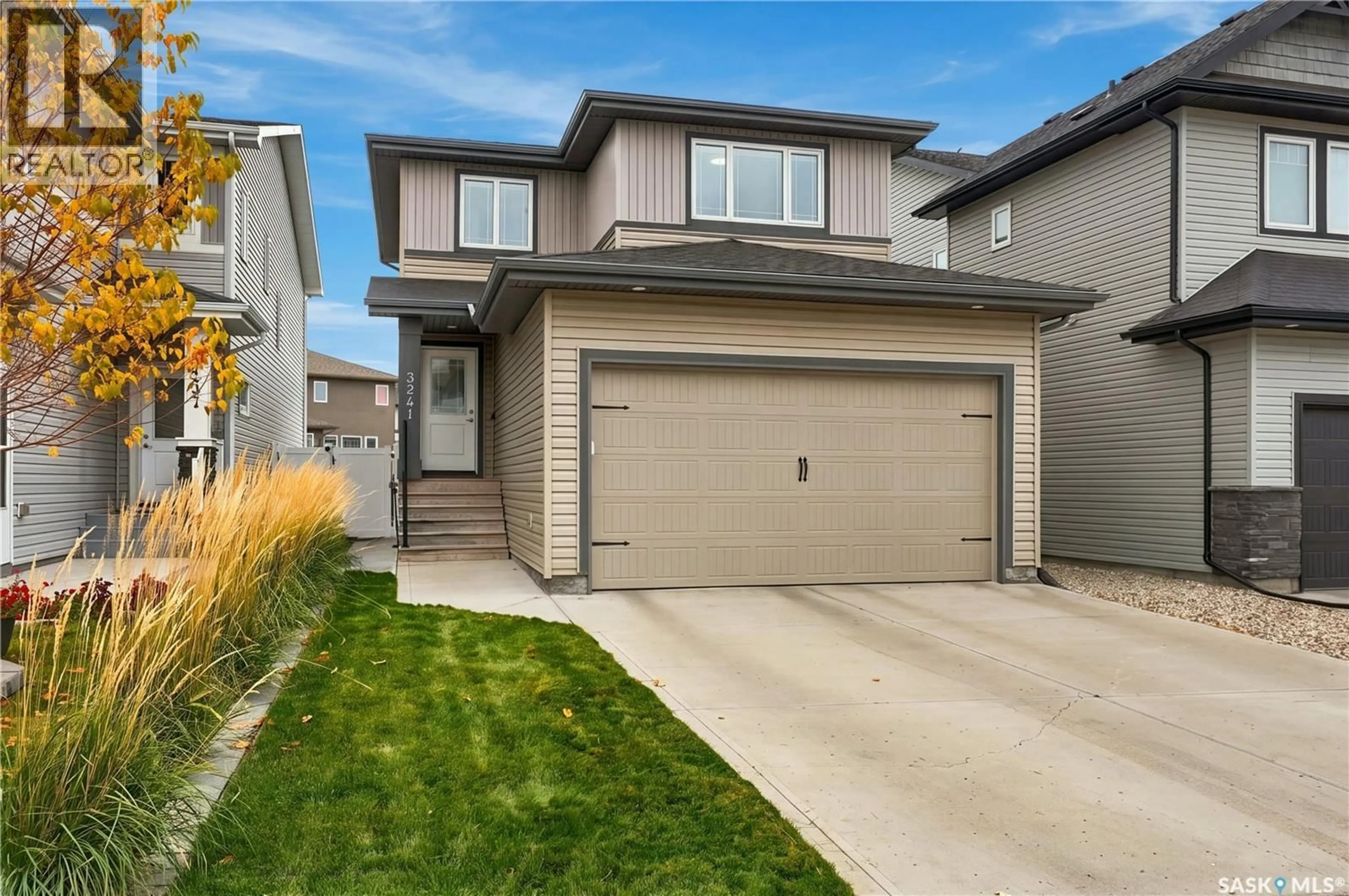 Home with vinyl exterior material, street for 3241 GREEN WATER DRIVE, Regina Saskatchewan S4V3R6