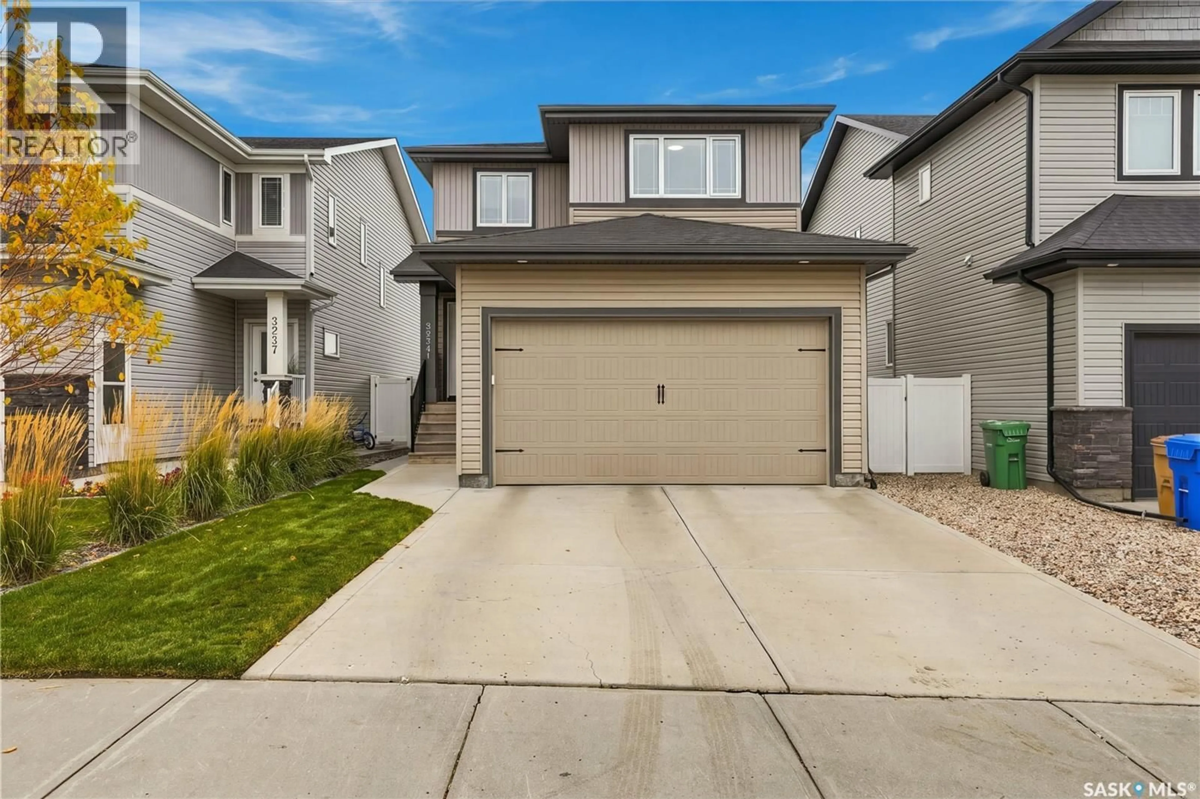 Home with vinyl exterior material, street for 3241 GREEN WATER DRIVE, Regina Saskatchewan S4V3R6