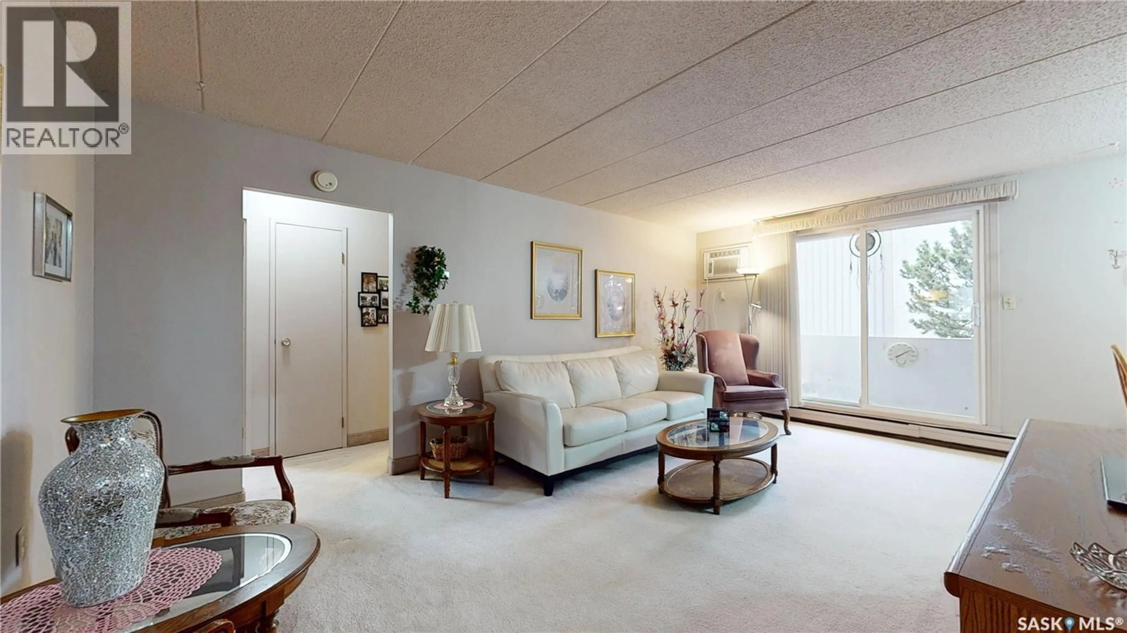 Living room with furniture, carpet floor for 65 - 130 WESTFIELD DRIVE, Regina Saskatchewan S4S6A3