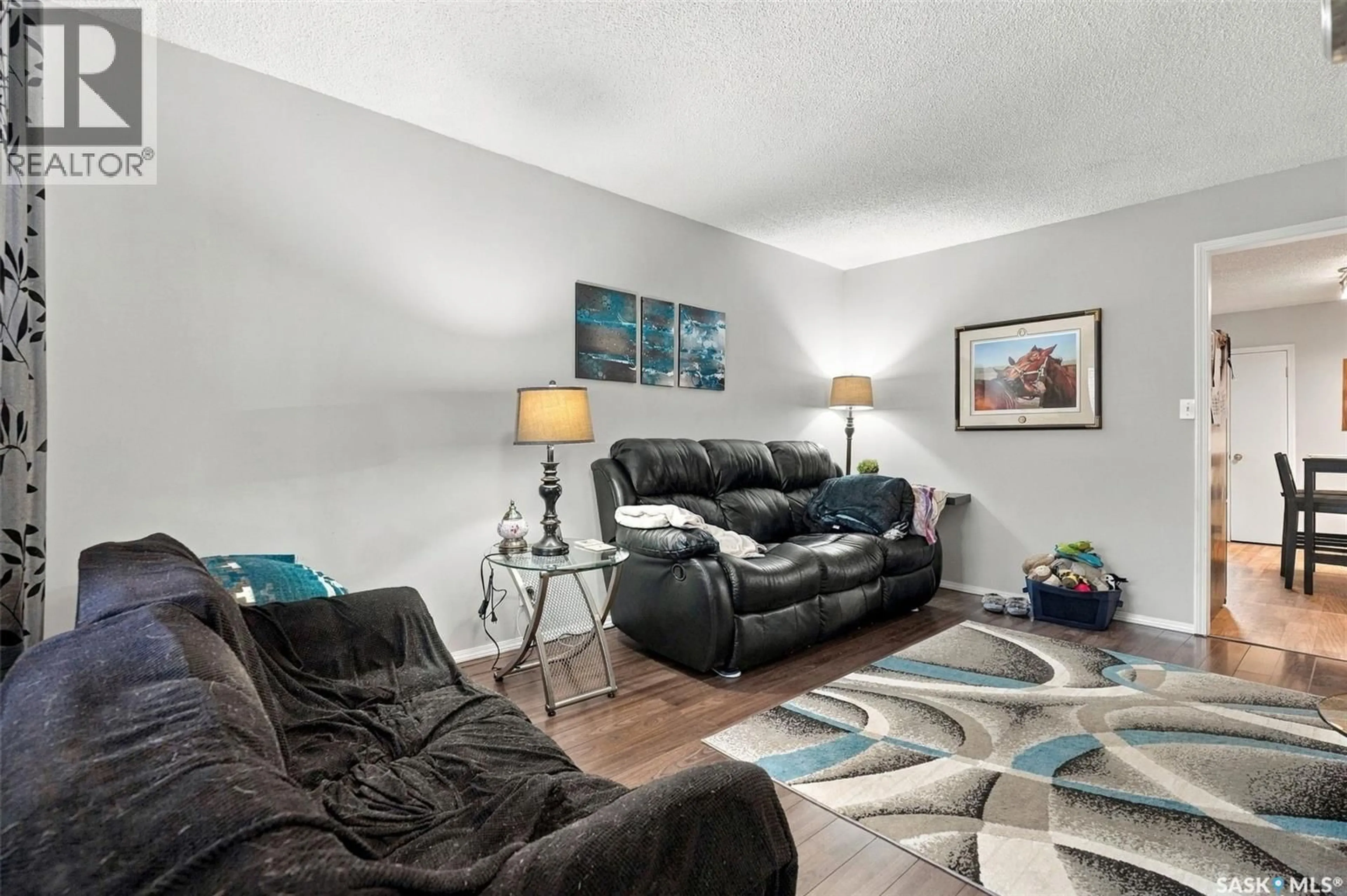 Living room with furniture, unknown for 98 MAGEE CRESCENT, Regina Saskatchewan S4R6K5