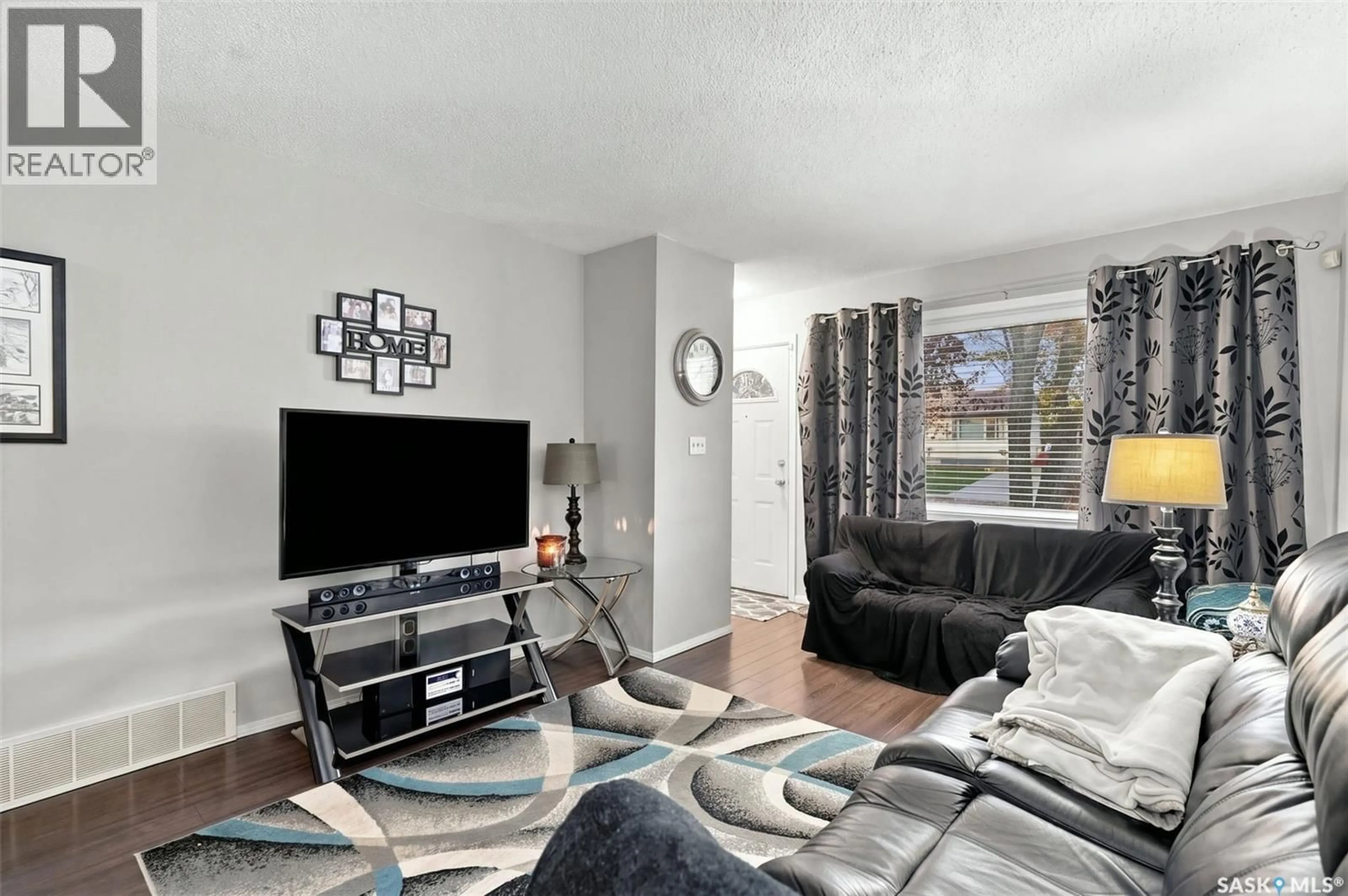 Living room with furniture, unknown for 98 MAGEE CRESCENT, Regina Saskatchewan S4R6K5